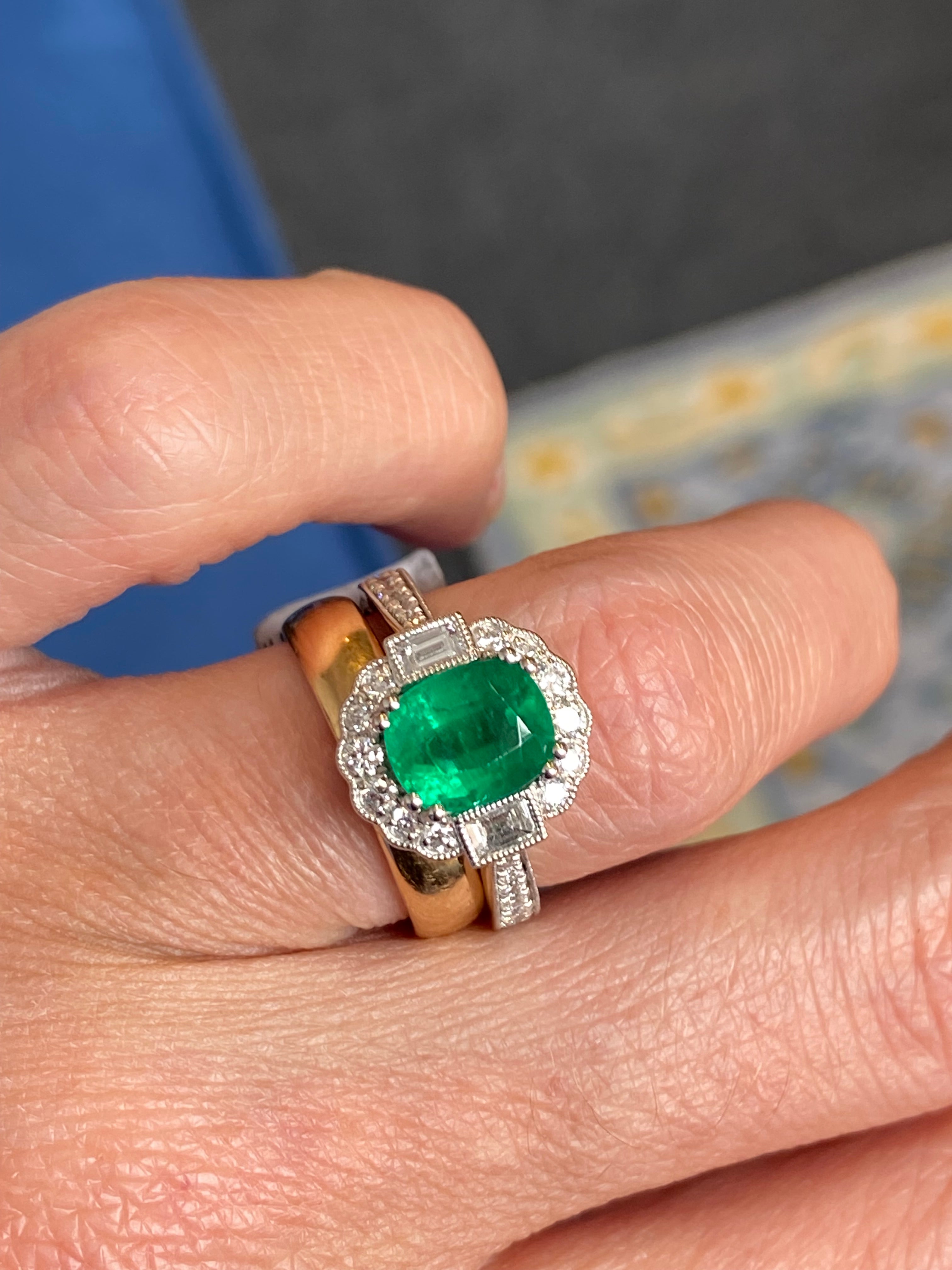 2.02 Carat Cushion Cut Emerald and 0.65 CTW Natural Diamond Halo Ring in Platinum