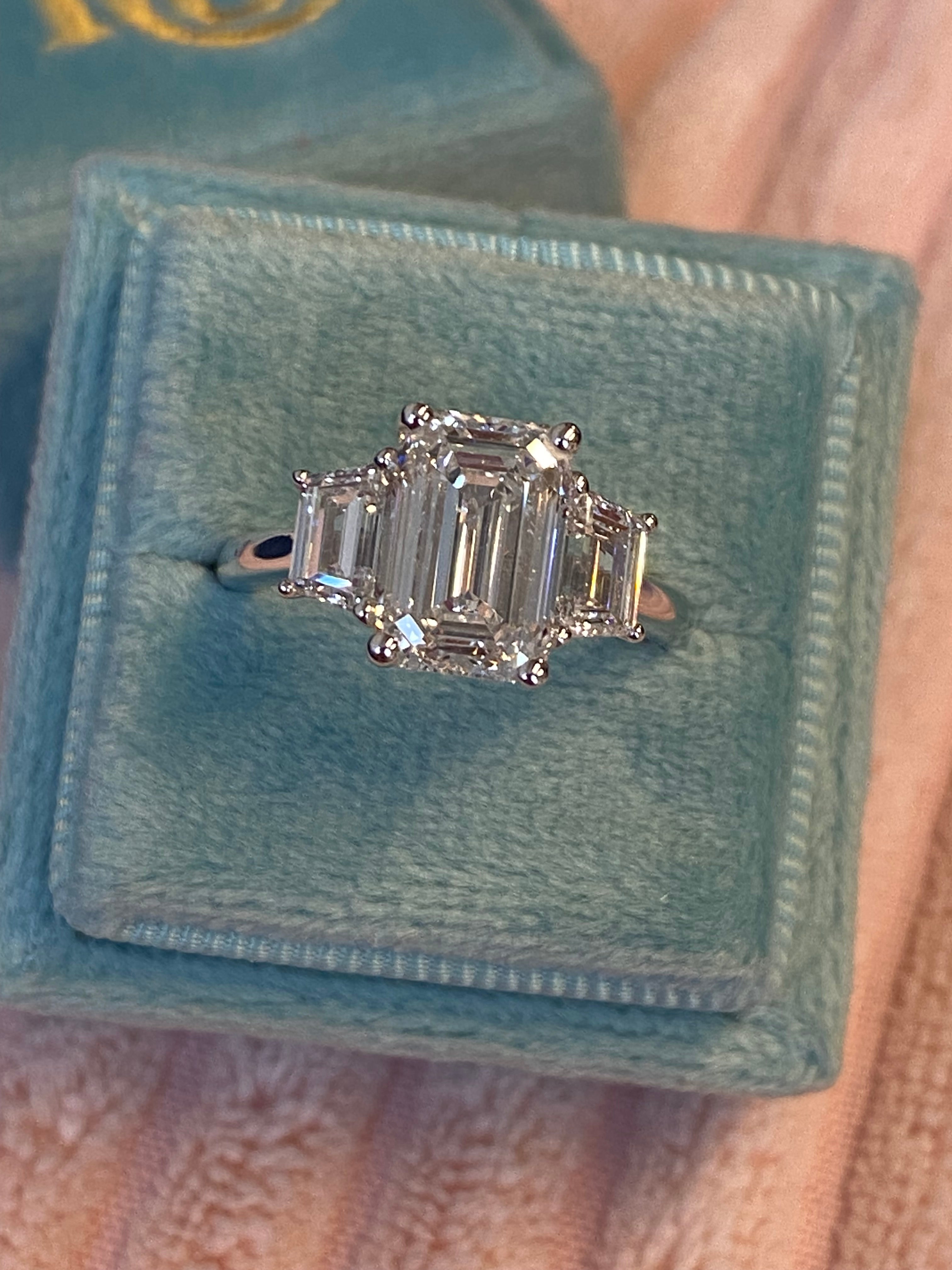 3.93 CTW Emerald and Trapezoid Cut D Colour VS1 Lab Diamond Three Stone Ring in Platinum