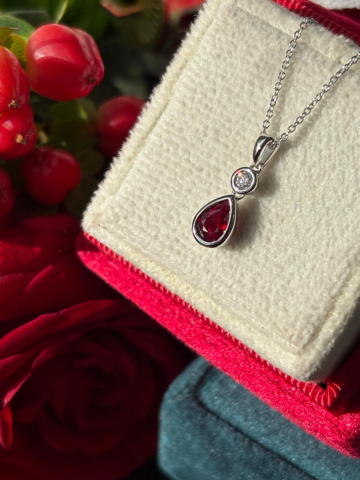 Pear Cut Ruby and Natural Diamond Pendant Necklace in 18ct White Gold