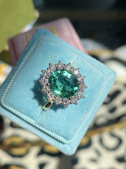 3.06 Carat Blue Tourmaline and Natural Diamond Halo Ring in Platinum and 18ct Yellow Gold