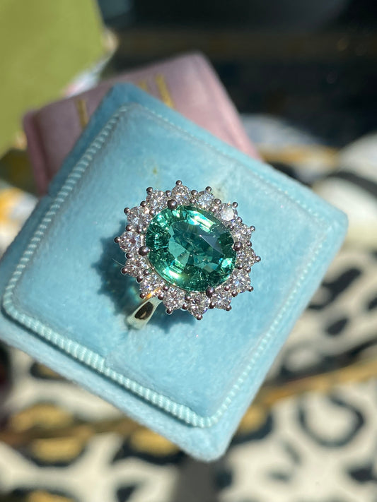 3.06 Carat Blue Tourmaline and Natural Diamond Halo Ring in Platinum and 18ct Yellow Gold