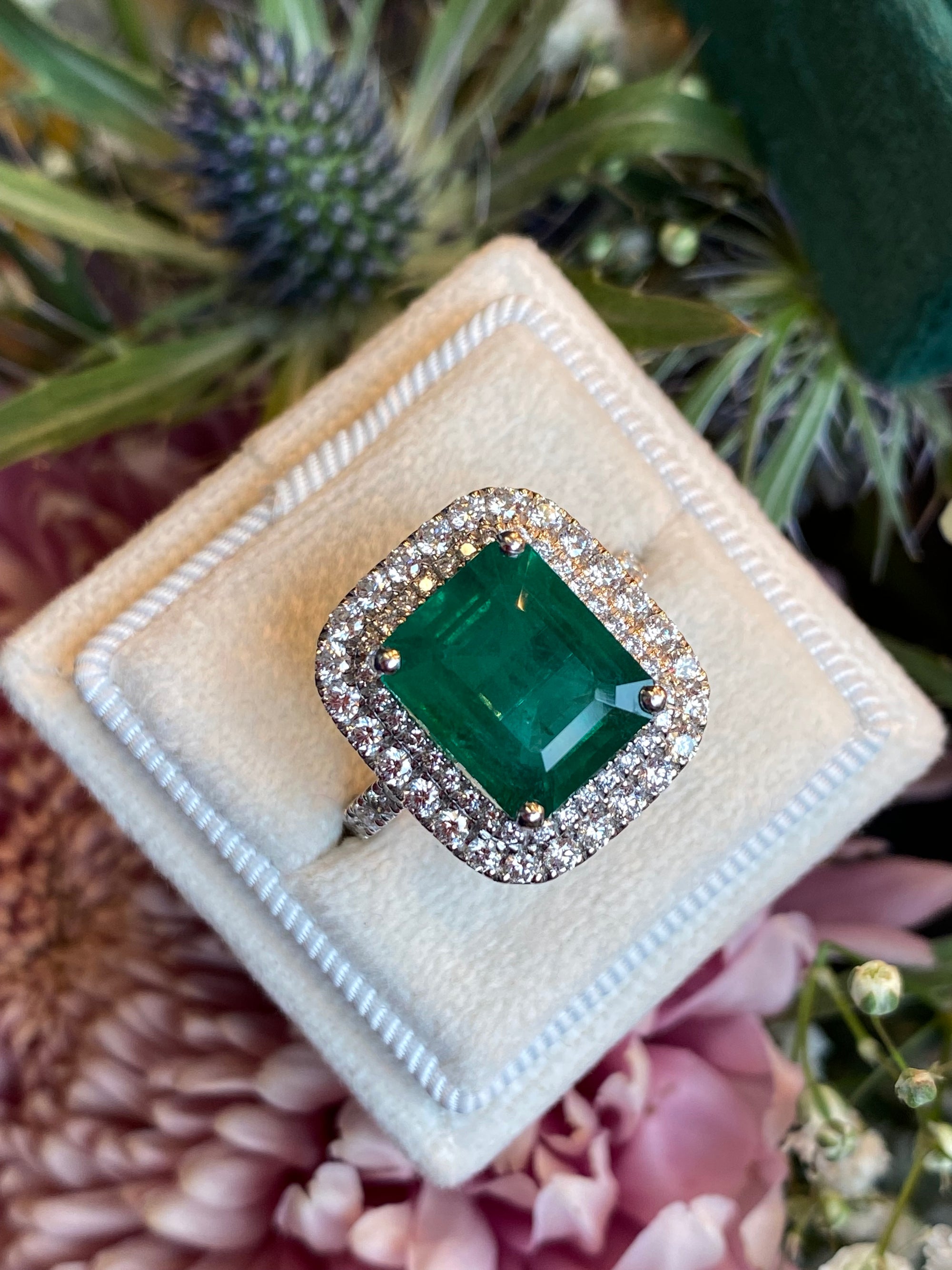 6.07 Carat Emerald Cut Emerald and Diamond Halo Ring in Platinum