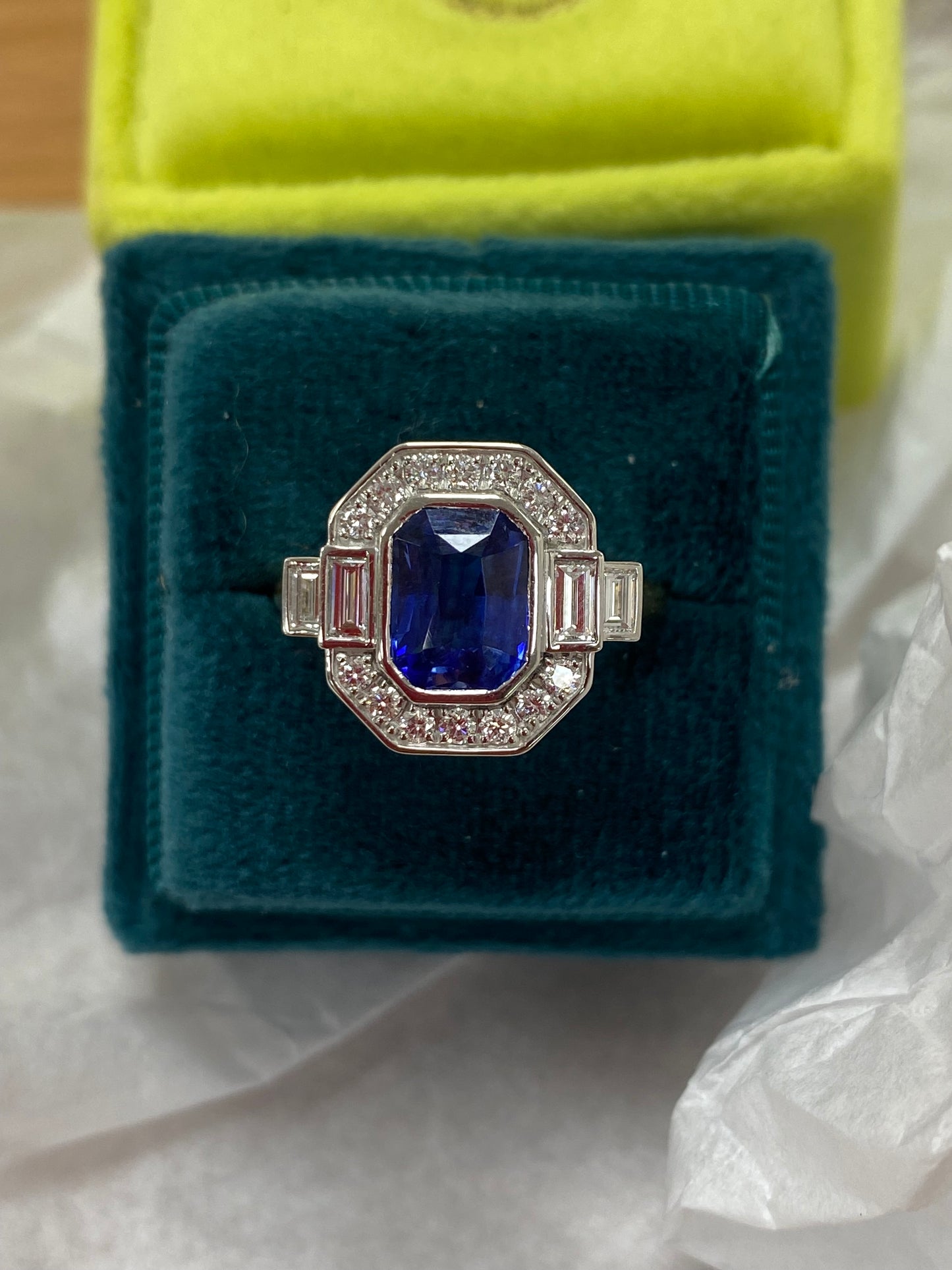 2.06 Carat Emerald Cut Sapphire and Natural Diamond Halo Ring in Platinum and 18ct Yellow Gold