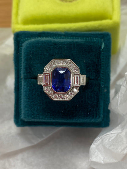 2.06 Carat Emerald Cut Sapphire and Natural Diamond Halo Ring in Platinum and 18ct Yellow Gold