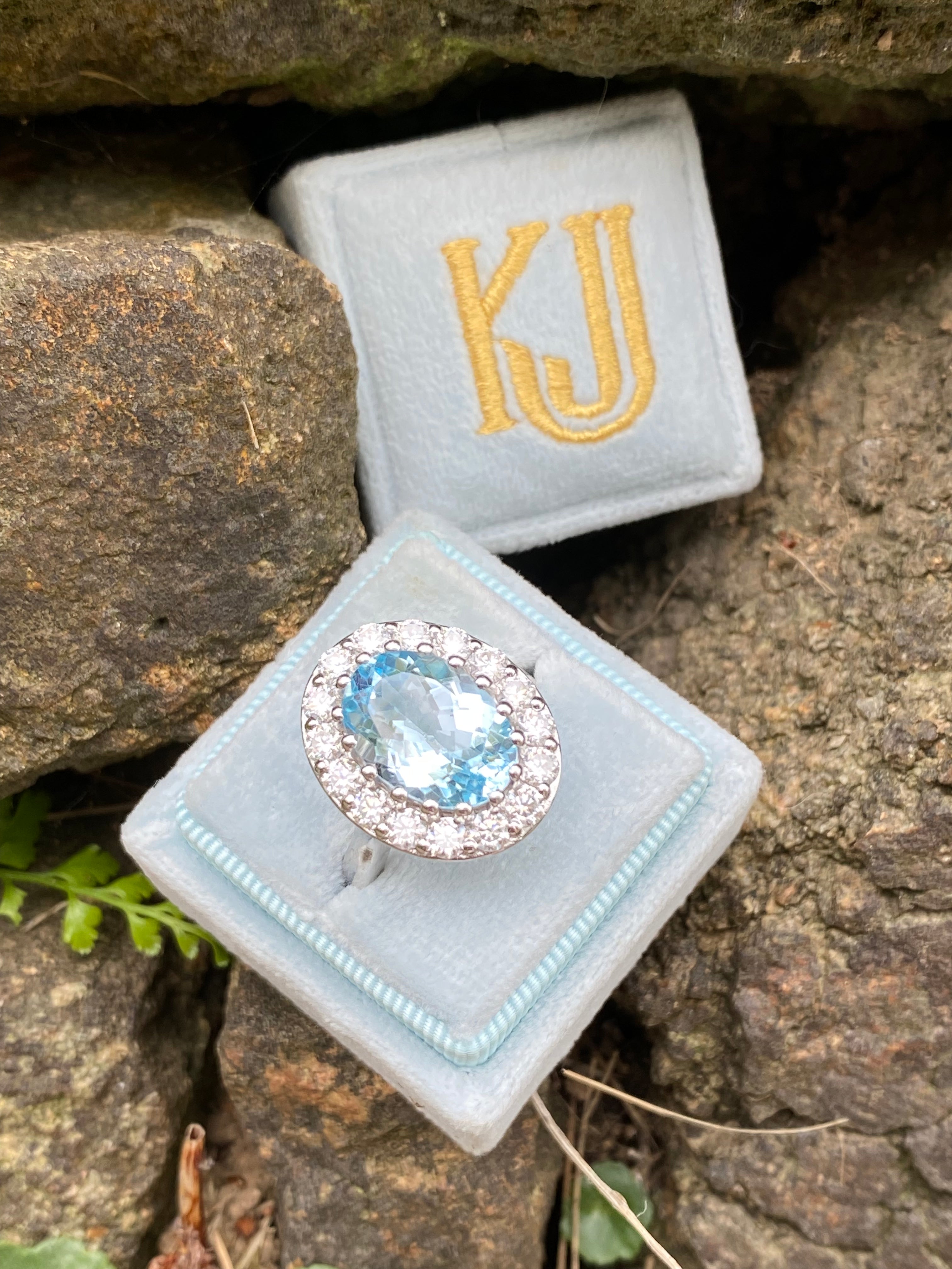 9.60 CTW Oval Cut Blue Topaz and Moissanite Halo Cocktail Ring in Sterling Silver