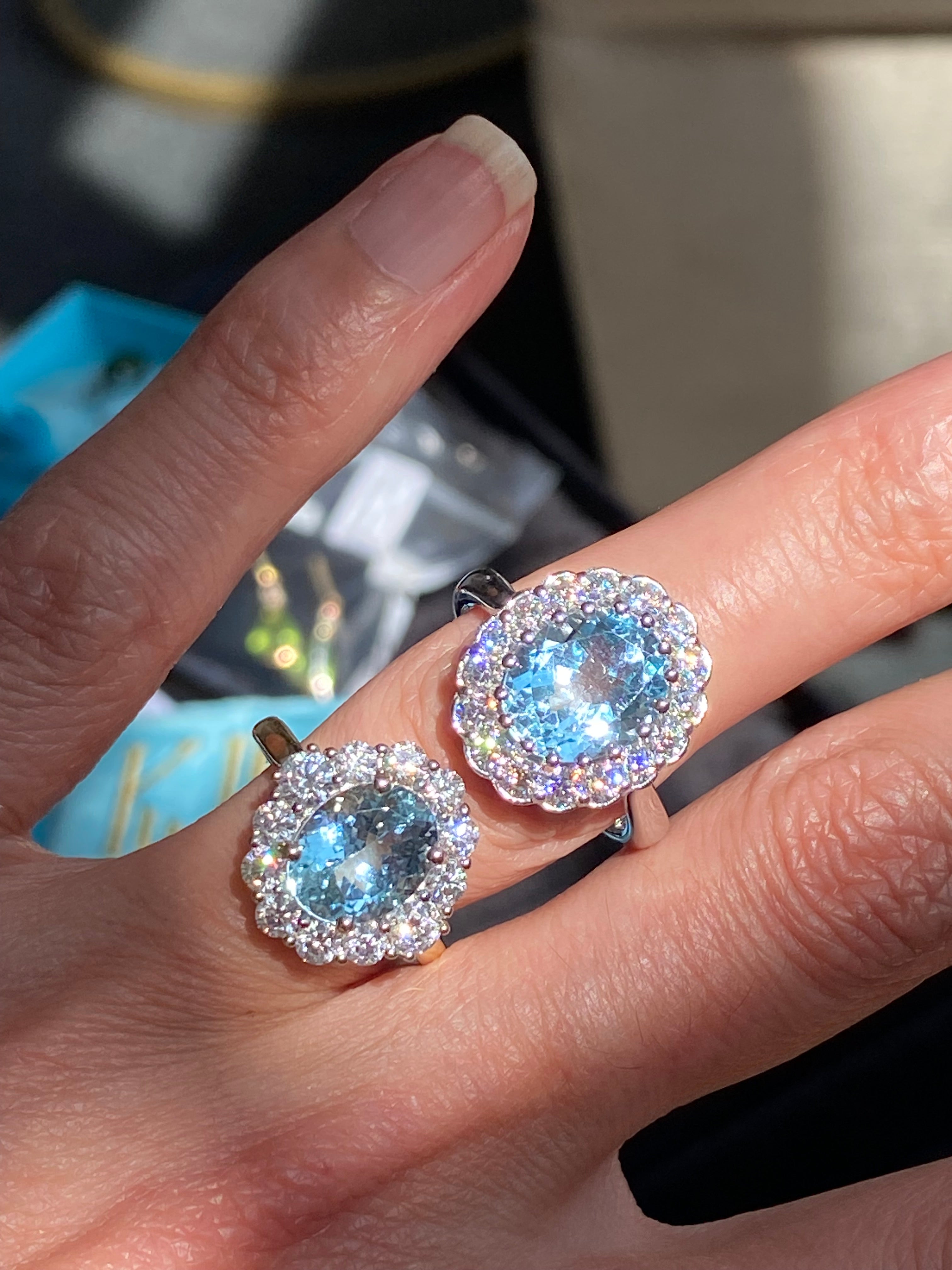 5.50 CTW Oval Cut Blue Topaz and Moissanite Halo Cocktail Ring