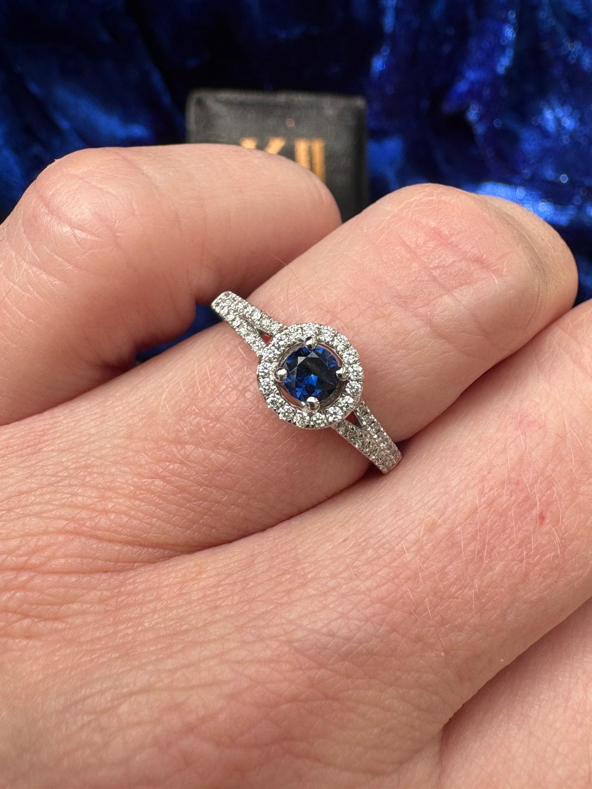 Beautiful Sapphire and Natural Diamond Halo Ring in 18ct White Gold
