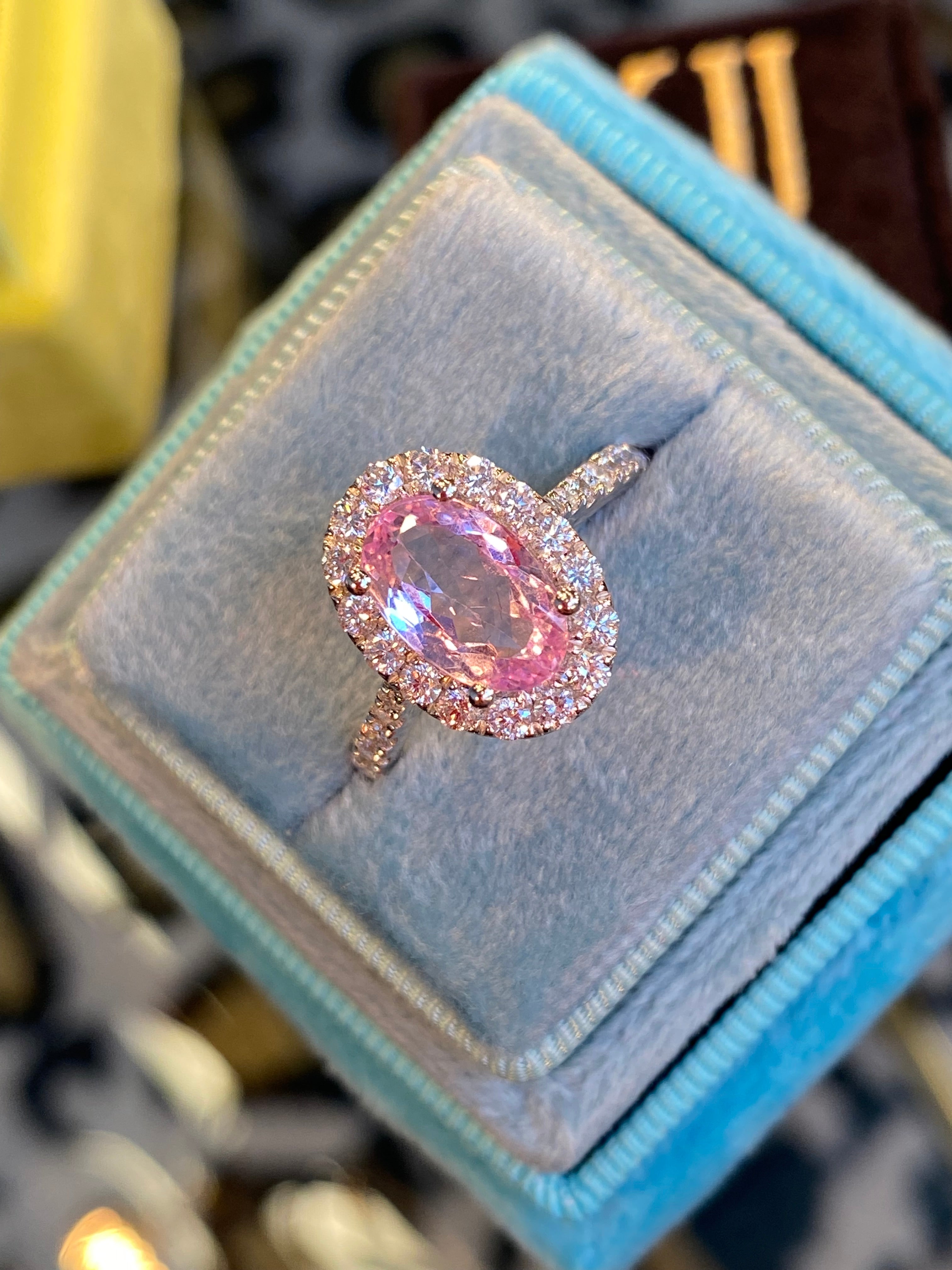 1.94 CTW Oval Cut Pink Topaz and Natural Diamond Halo Ring in Platinum