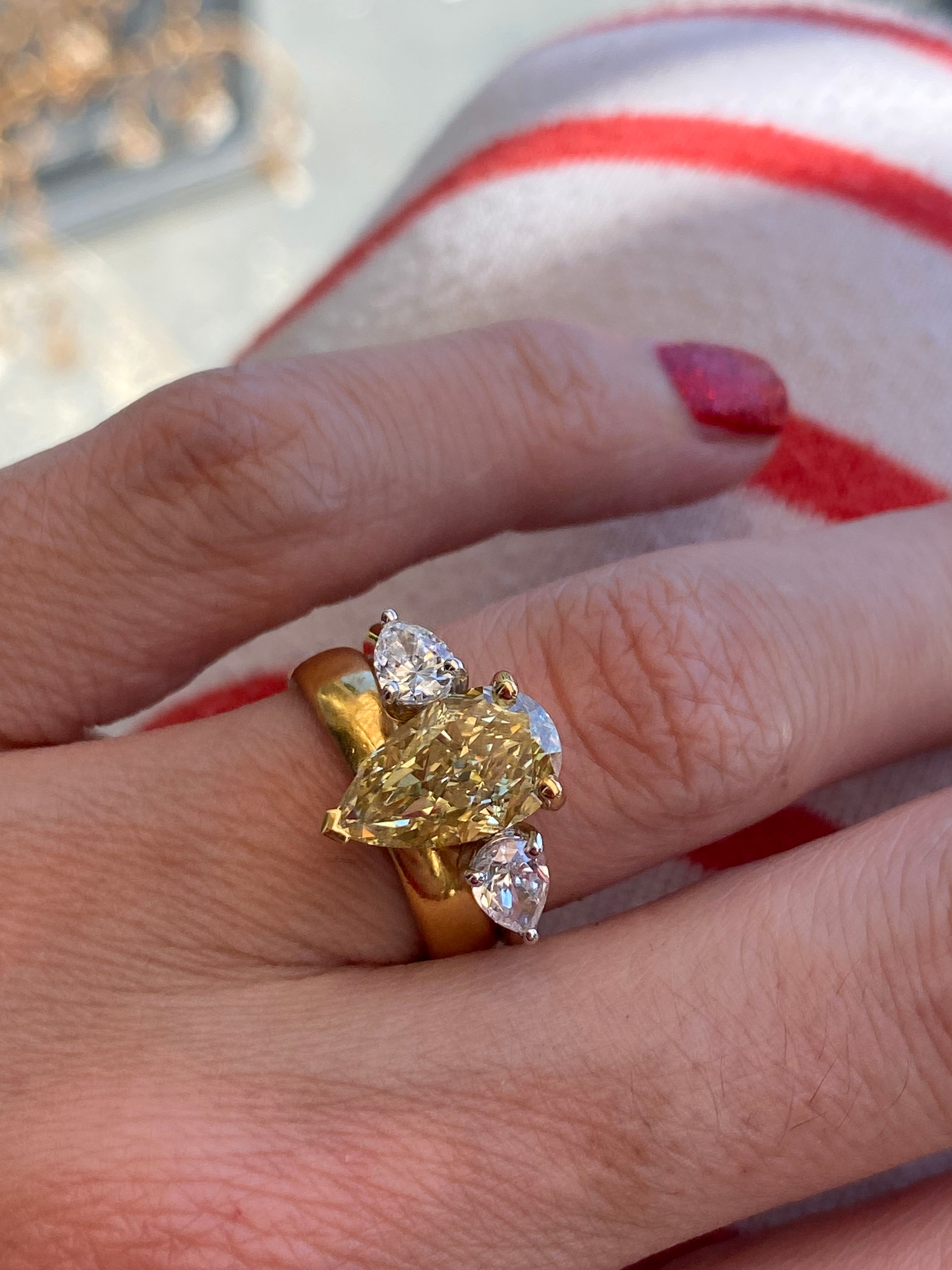 4.04 CTW Pear Cut Fancy Yellow Lab Diamond Three Stone Engagement Ring in 18ct Yellow and White Gold