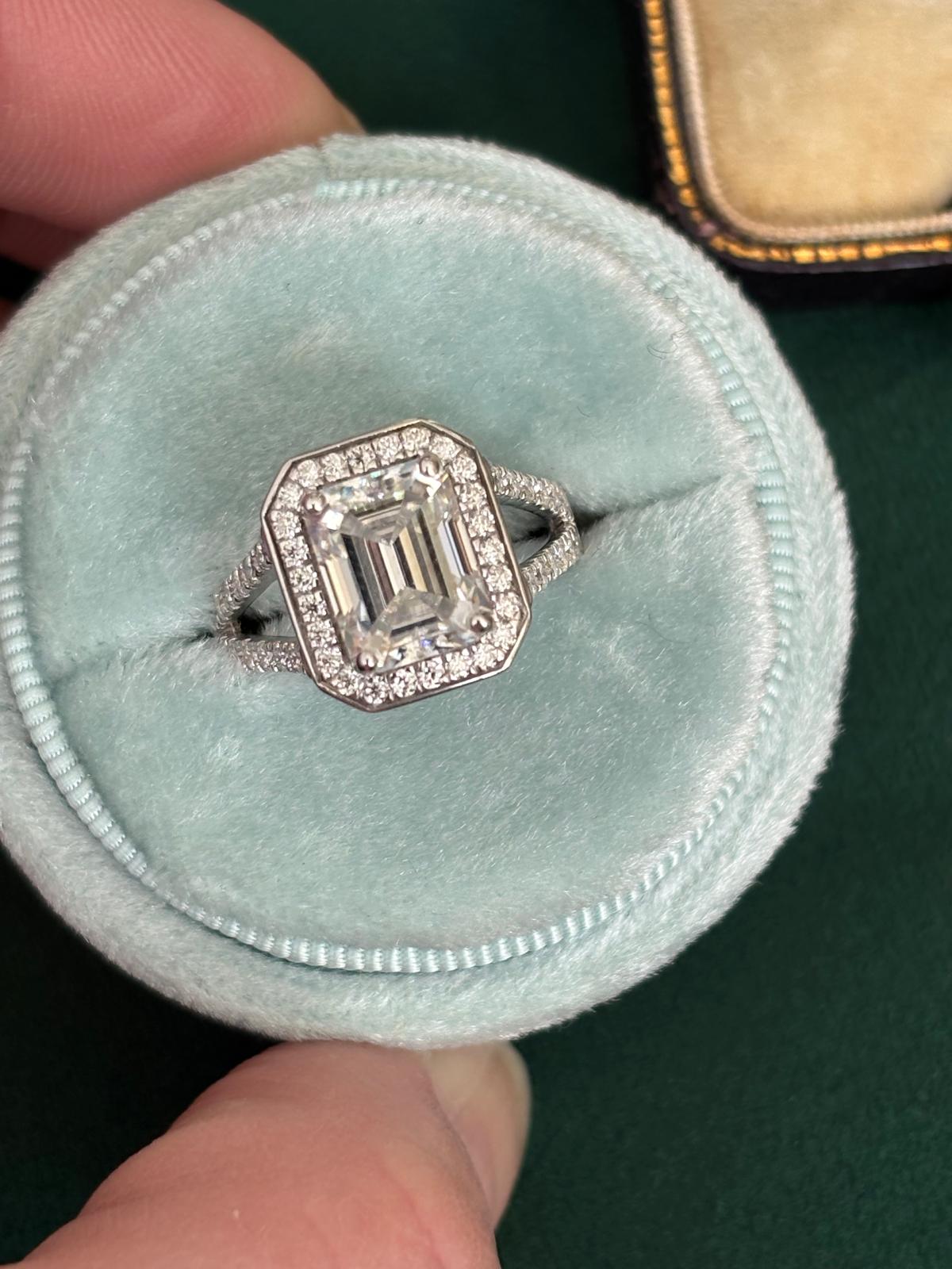 3.10 CTW Emerald Cut Moissanite Halo Ring in Sterling Silver