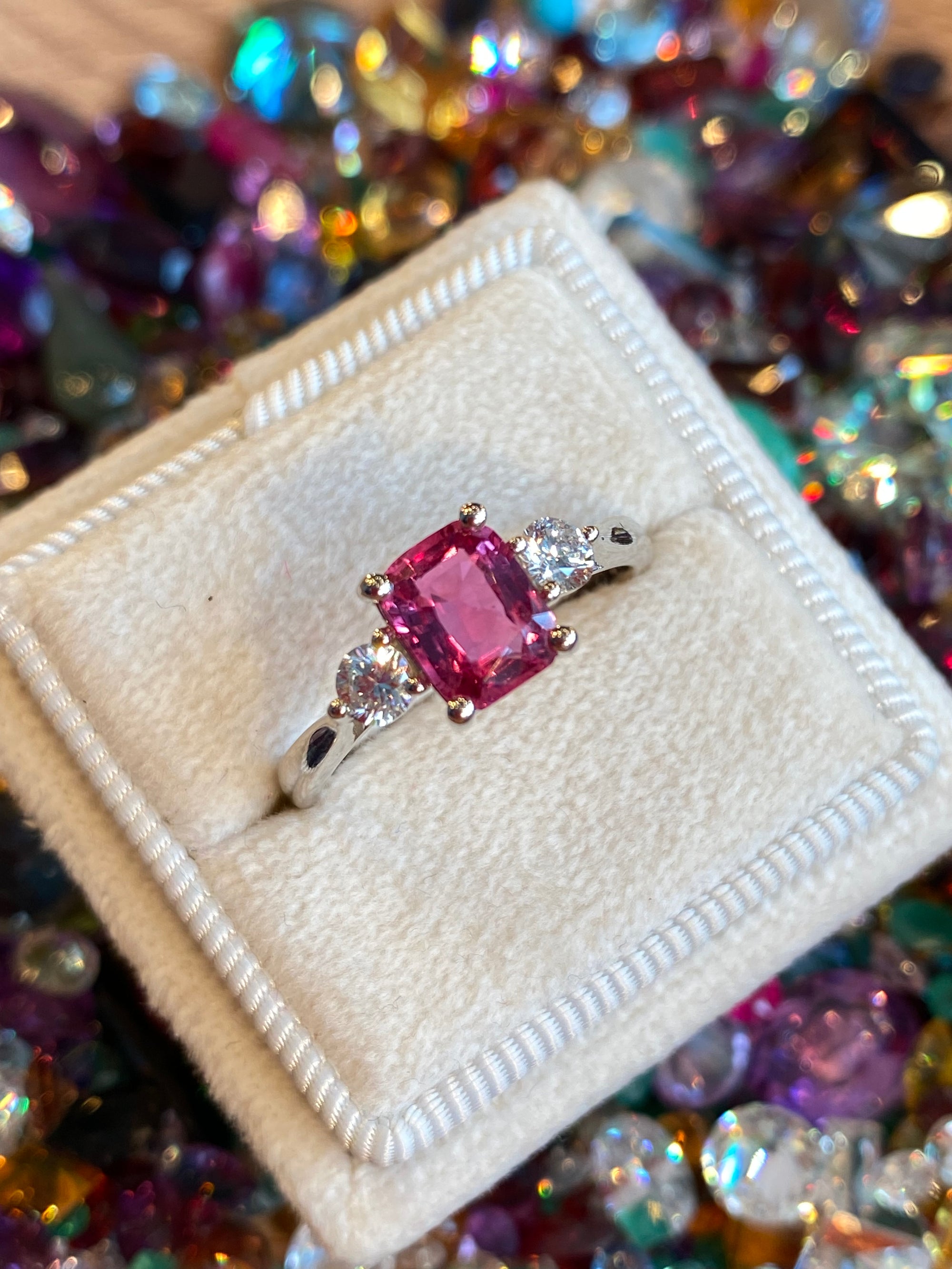 1.52 CTW Cushion Cut Ruby and Natural Diamond Three-Stone Engagement Ring in Platinum