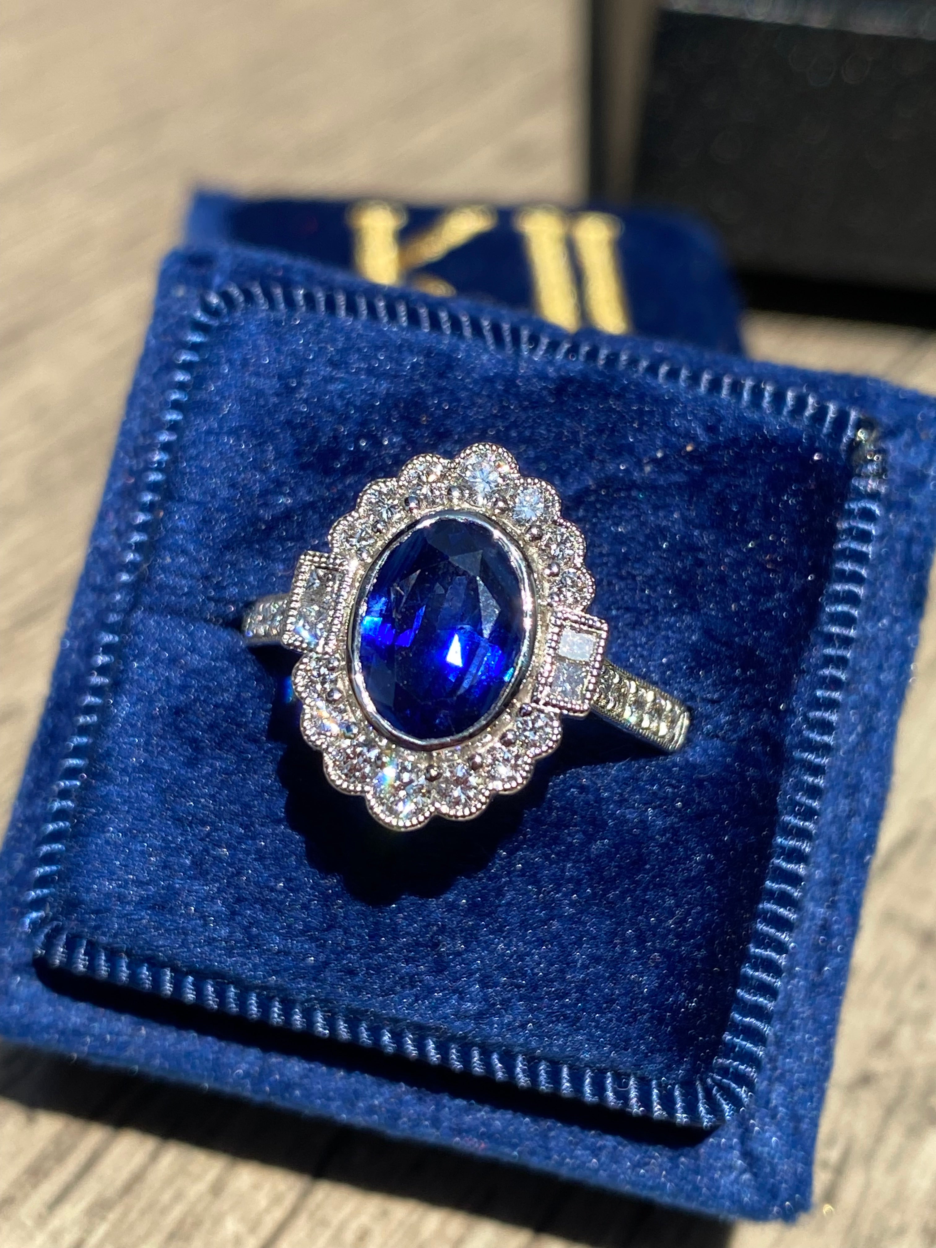 1.95 Carat Blue Ceylon Sapphire and Natural Diamond Halo Ring in Platinum