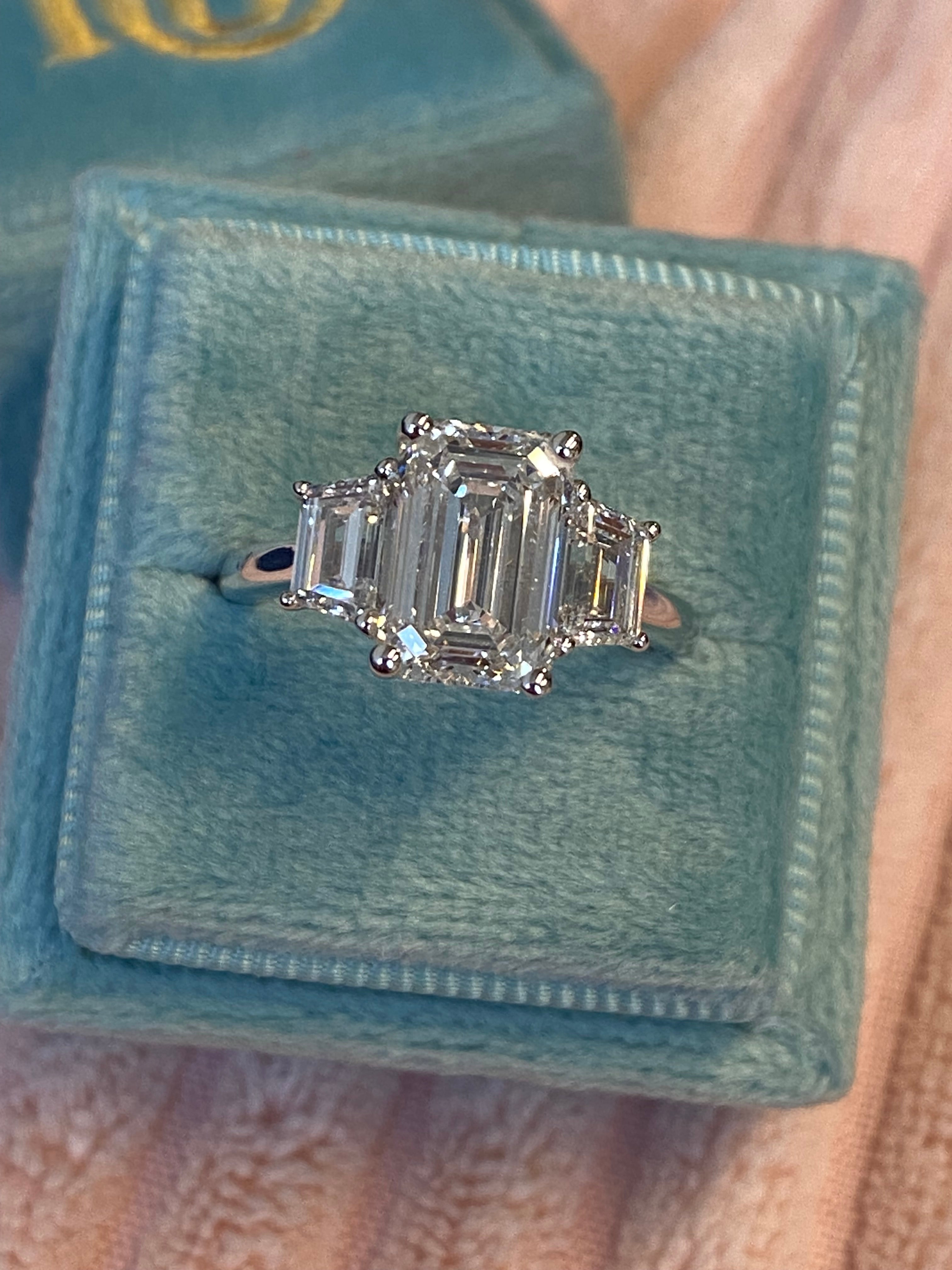 3.93 CTW Emerald and Trapezoid Cut D Colour VS1 Lab Diamond Three Stone Ring in Platinum