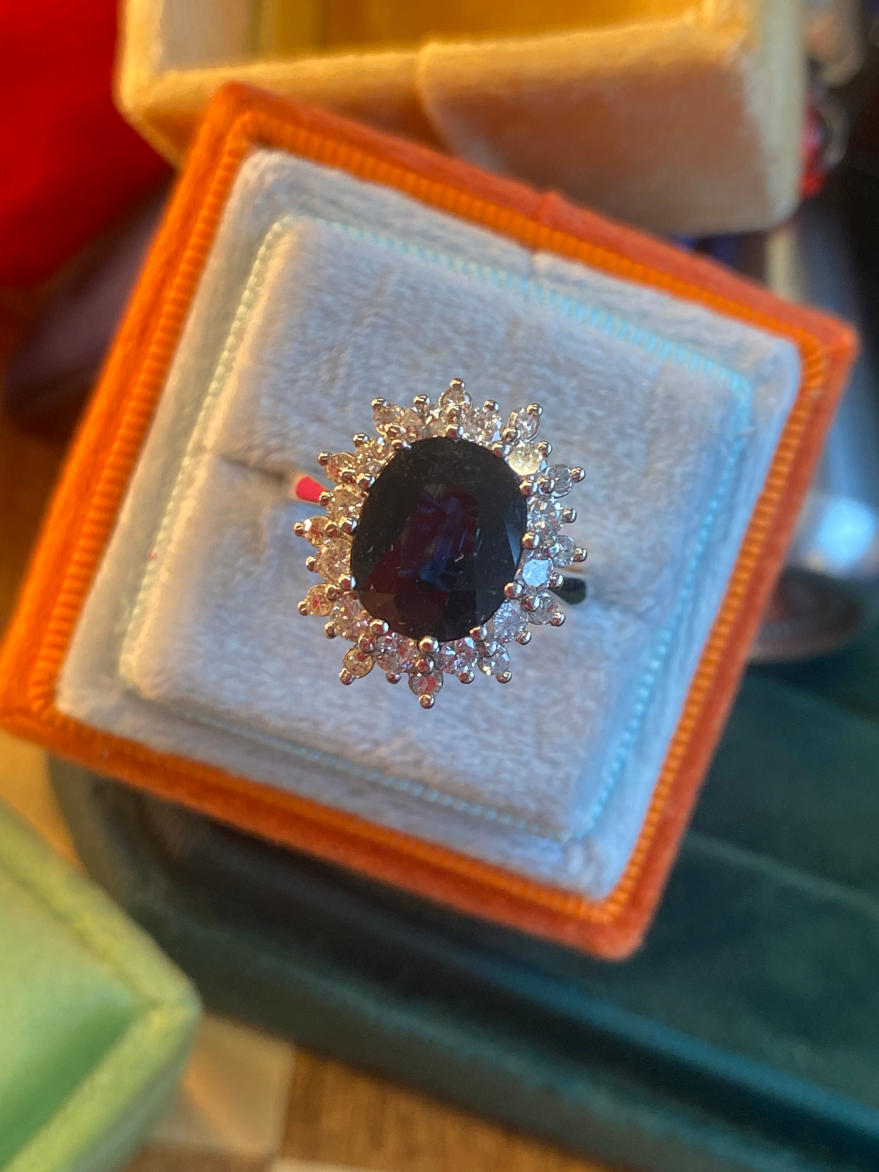 2.75 Carat Oval Blue Sapphire and 1.00 Carat Diamond Halo Ring in 18ct White Gold