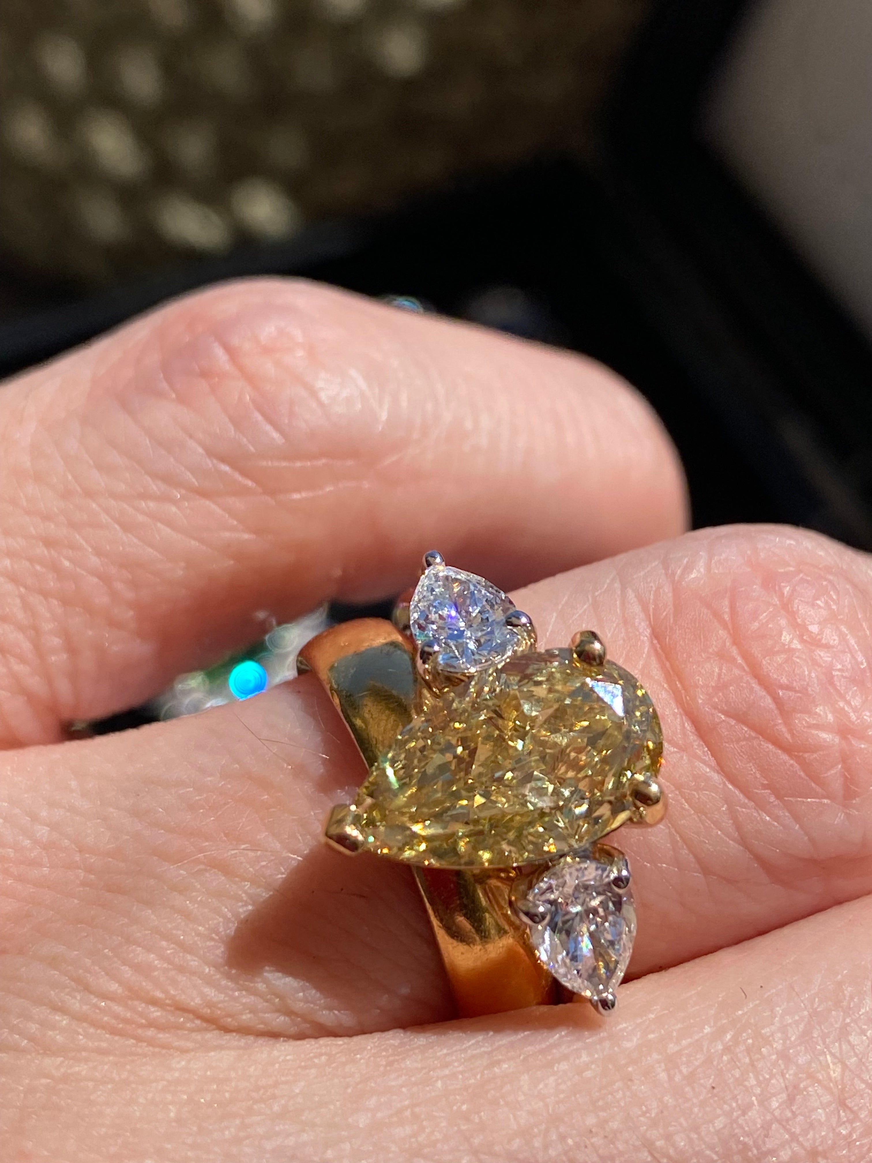 4.04 CTW Pear Cut Fancy Yellow Lab Diamond Three Stone Engagement Ring in 18ct Yellow and White Gold