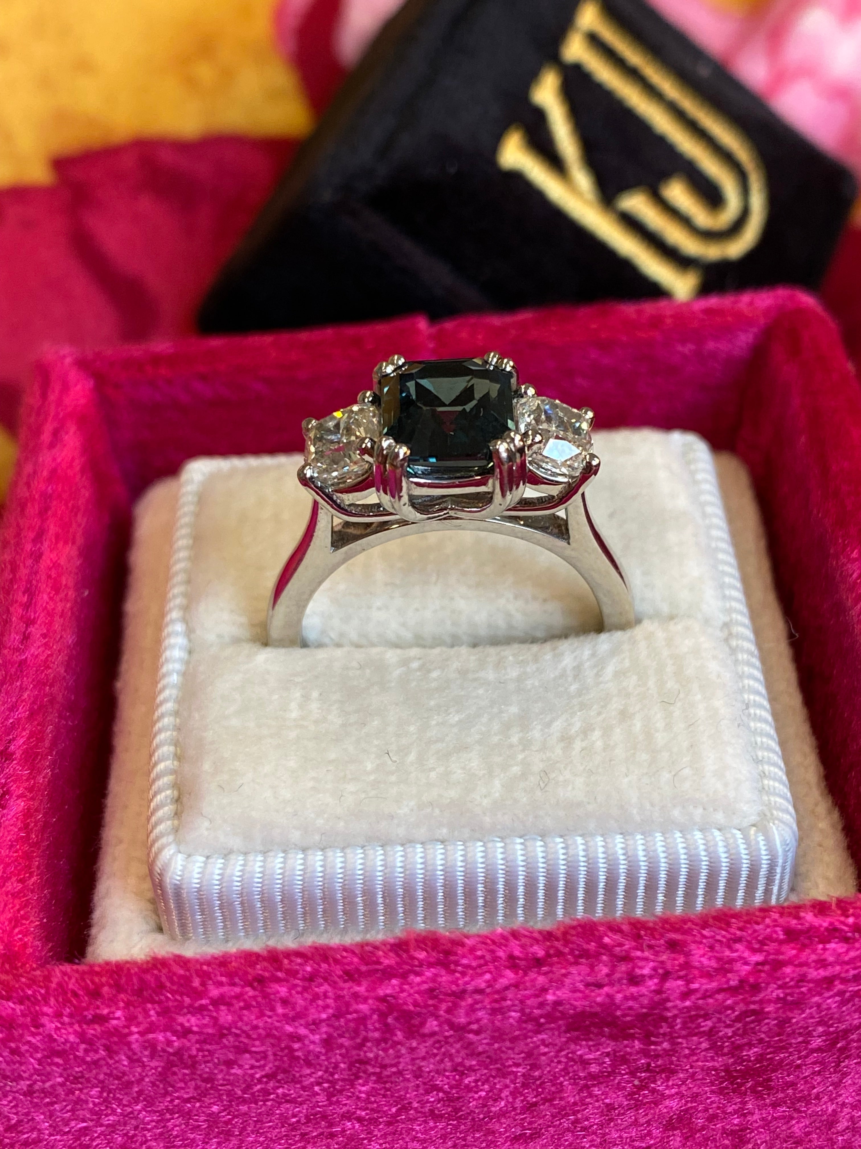 2.42 Carat Teal Sapphire and 0.97 CTW Natural Diamond Three Stone Ring in Platinum
