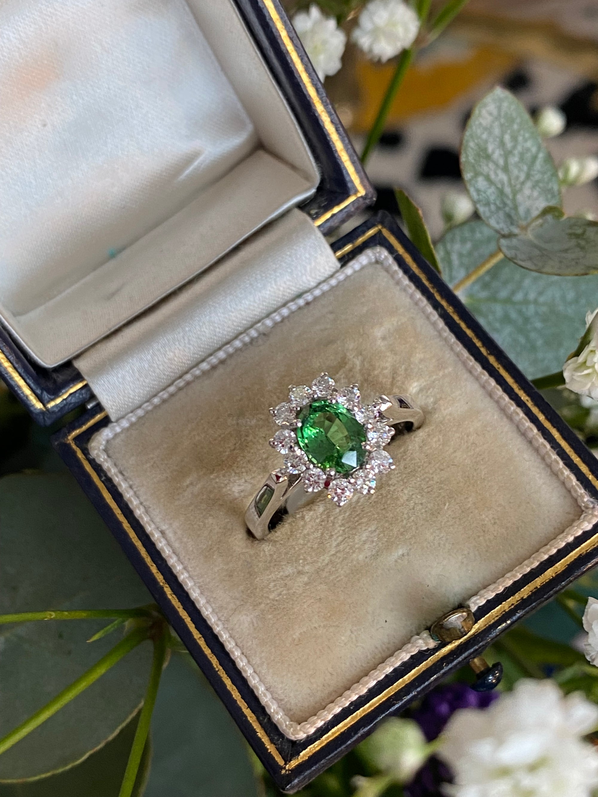 1.50 CTW Tsavorite Garnet and Diamond Halo Engagement Ring in 18ct White Gold