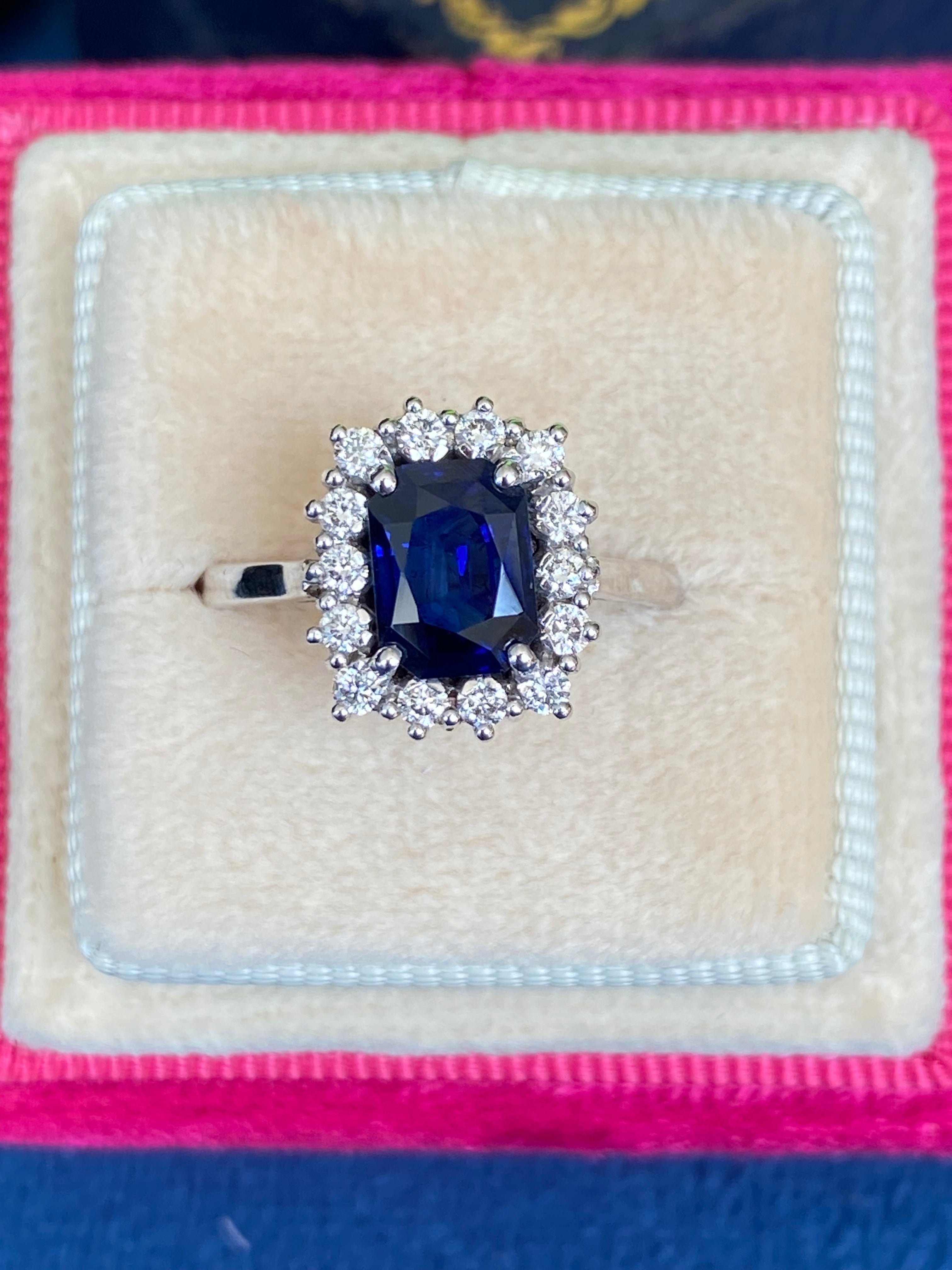 Vintage 2.05 Carat Sapphire and Natural Diamond Halo Ring in Platinum