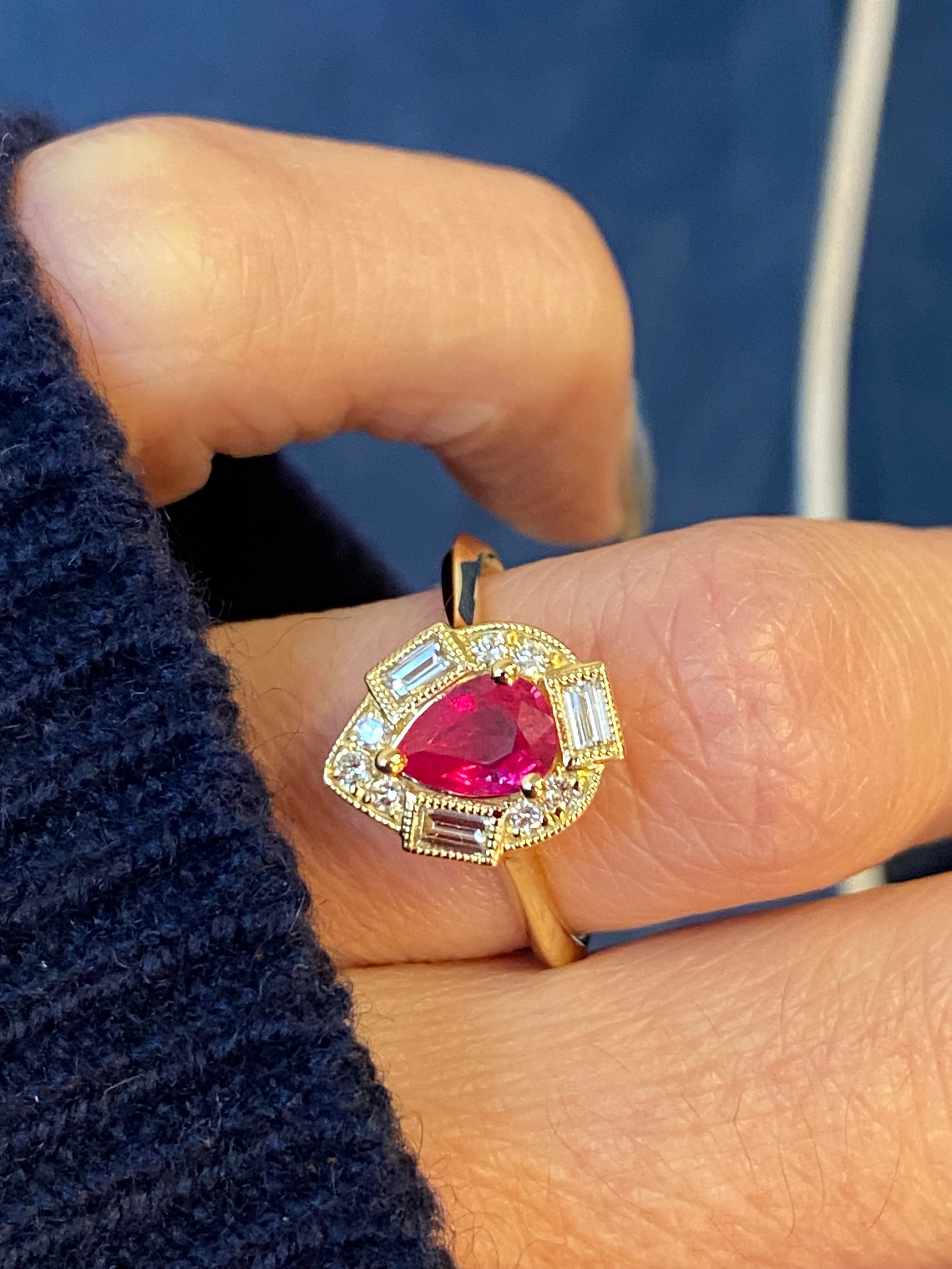 0.85 CTW Pear Cut Ruby and Natural Diamond Halo Ring in 18ct Yellow Gold