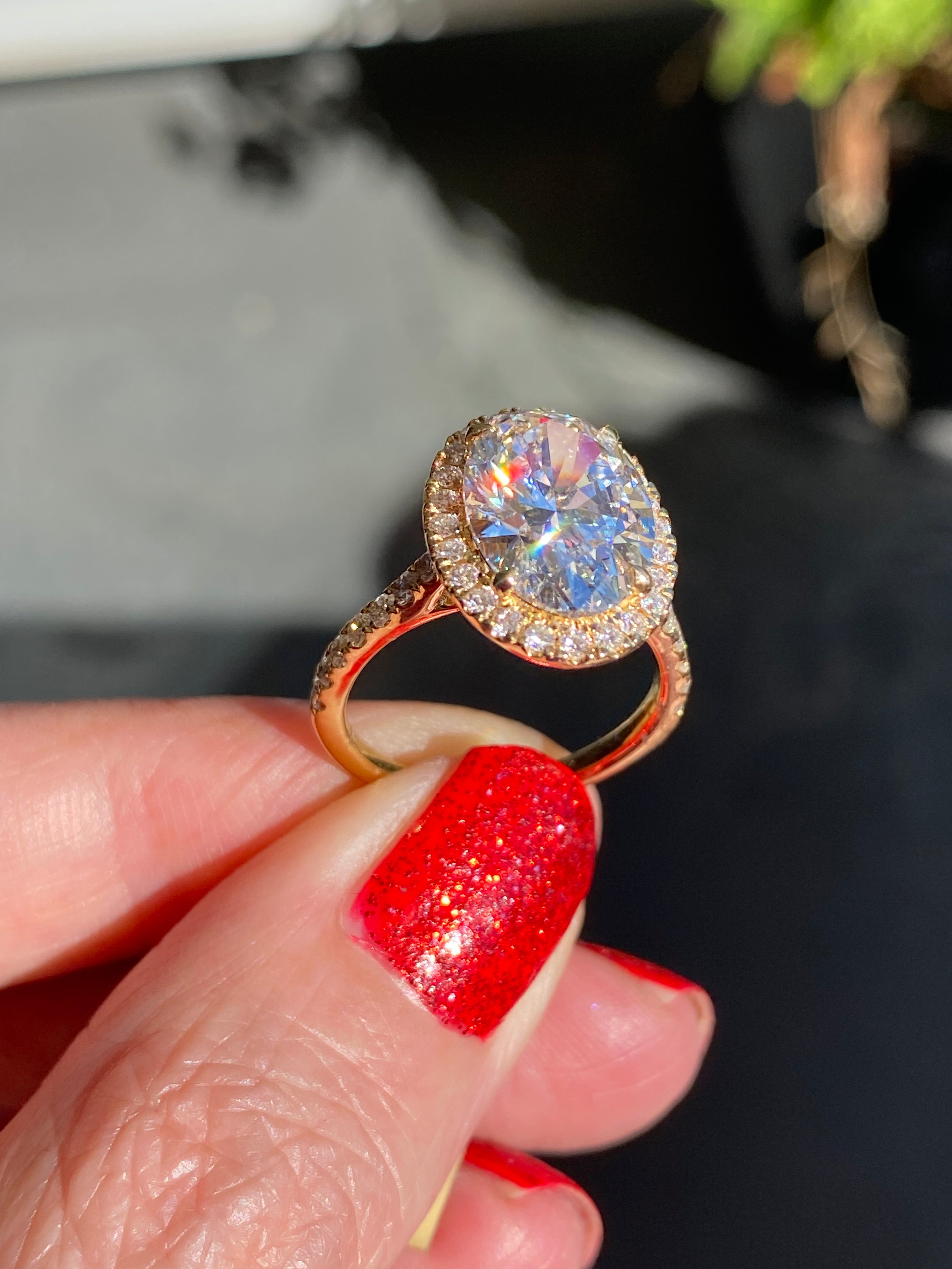 4.59 CTW Oval Cut Lab Diamond Halo Engagement Ring in 18ct Yellow Gold