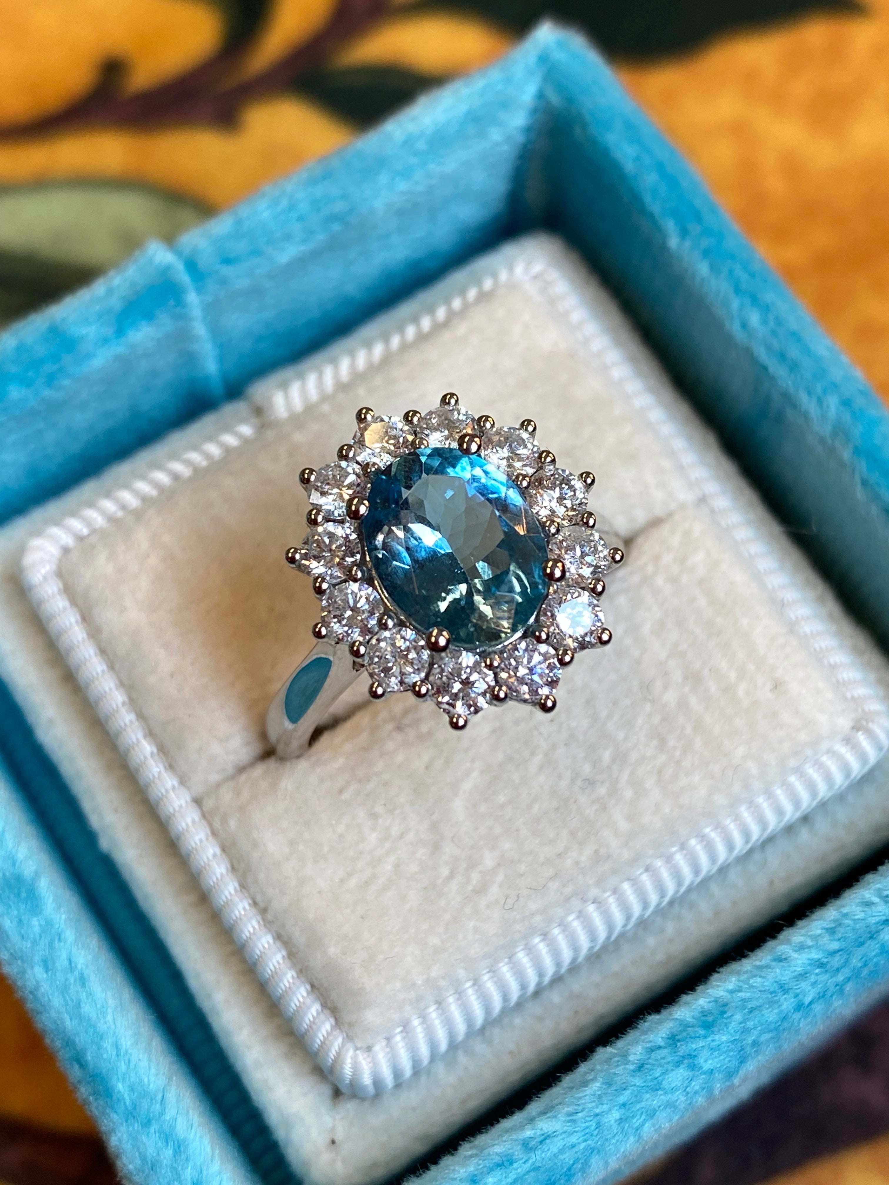 2.68 CTW Oval Cut Aquamarine and Natural Diamond Halo Engagement Ring in Platinum