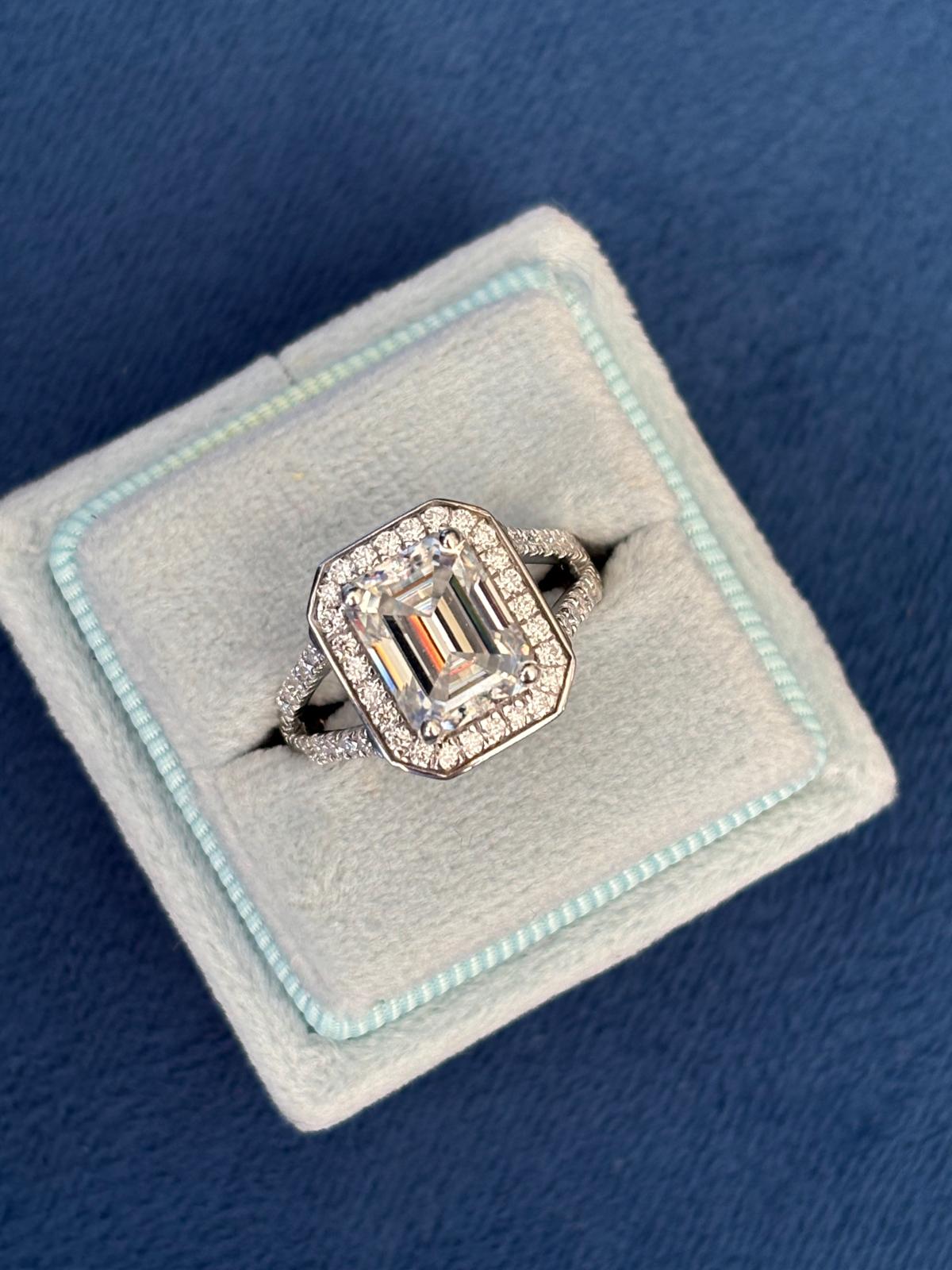 3.10 CTW Emerald Cut Moissanite Halo Ring in Sterling Silver