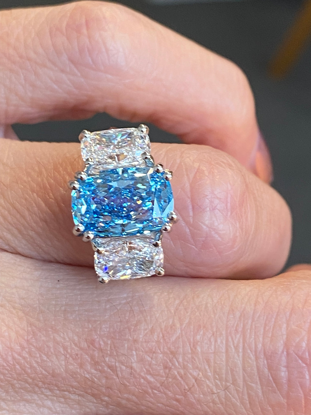 6.60 CTW Fancy Blue Cushion Cut Lab Diamond Graduated Three Stone Ring in Platinum