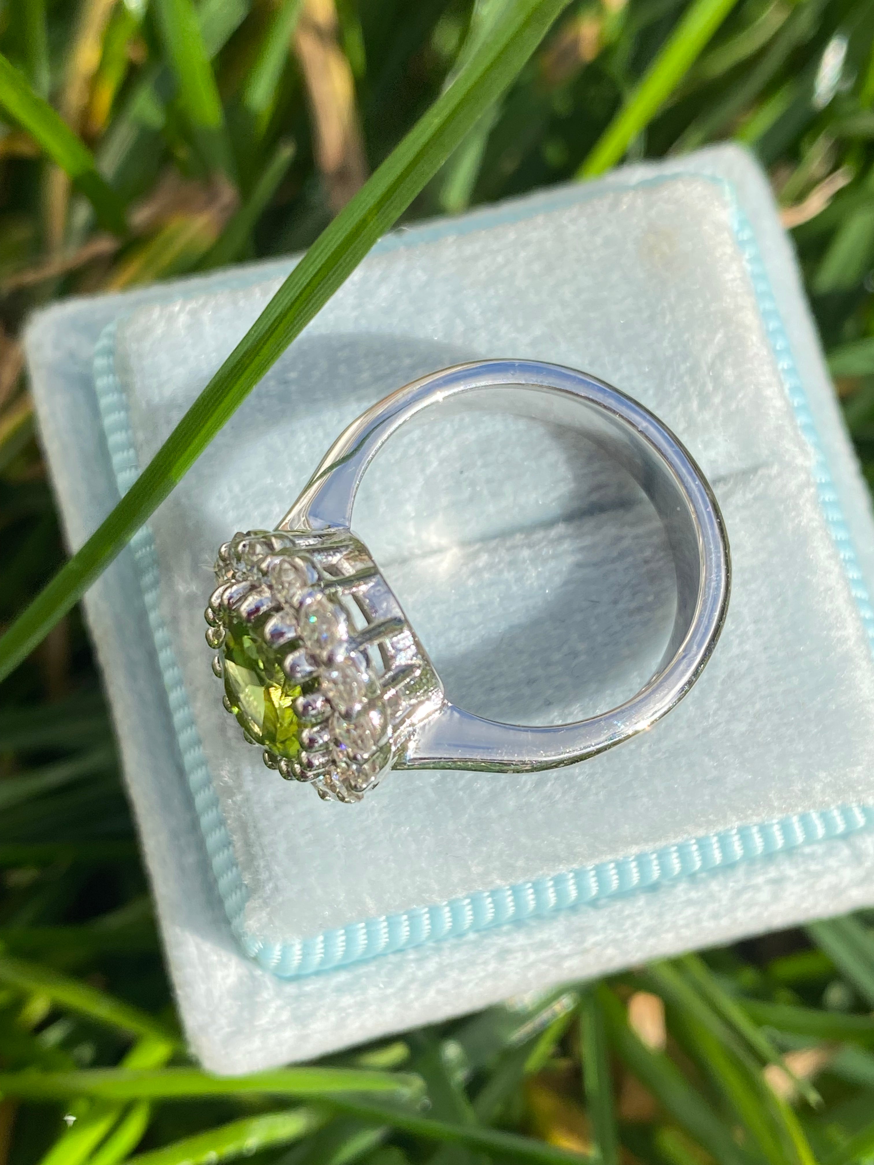 2.33 CTW Oval Cut Peridot and Moissanite Halo Cocktail Ring in Sterling Silver