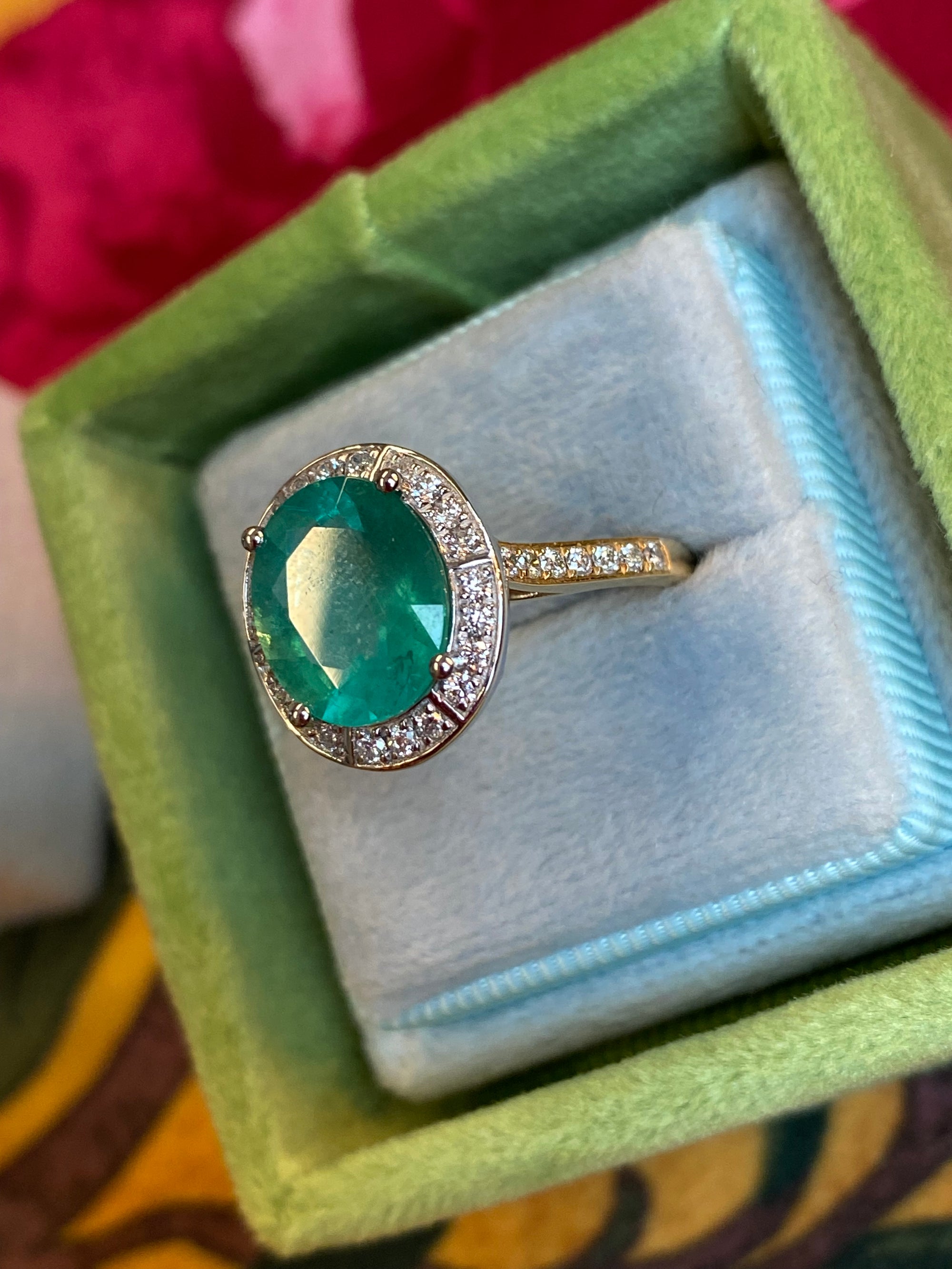 3.21 CTW Oval Cut Emerald and Natural Diamond Halo Engagement Ring in Platinum and 18ct Yellow Gold
