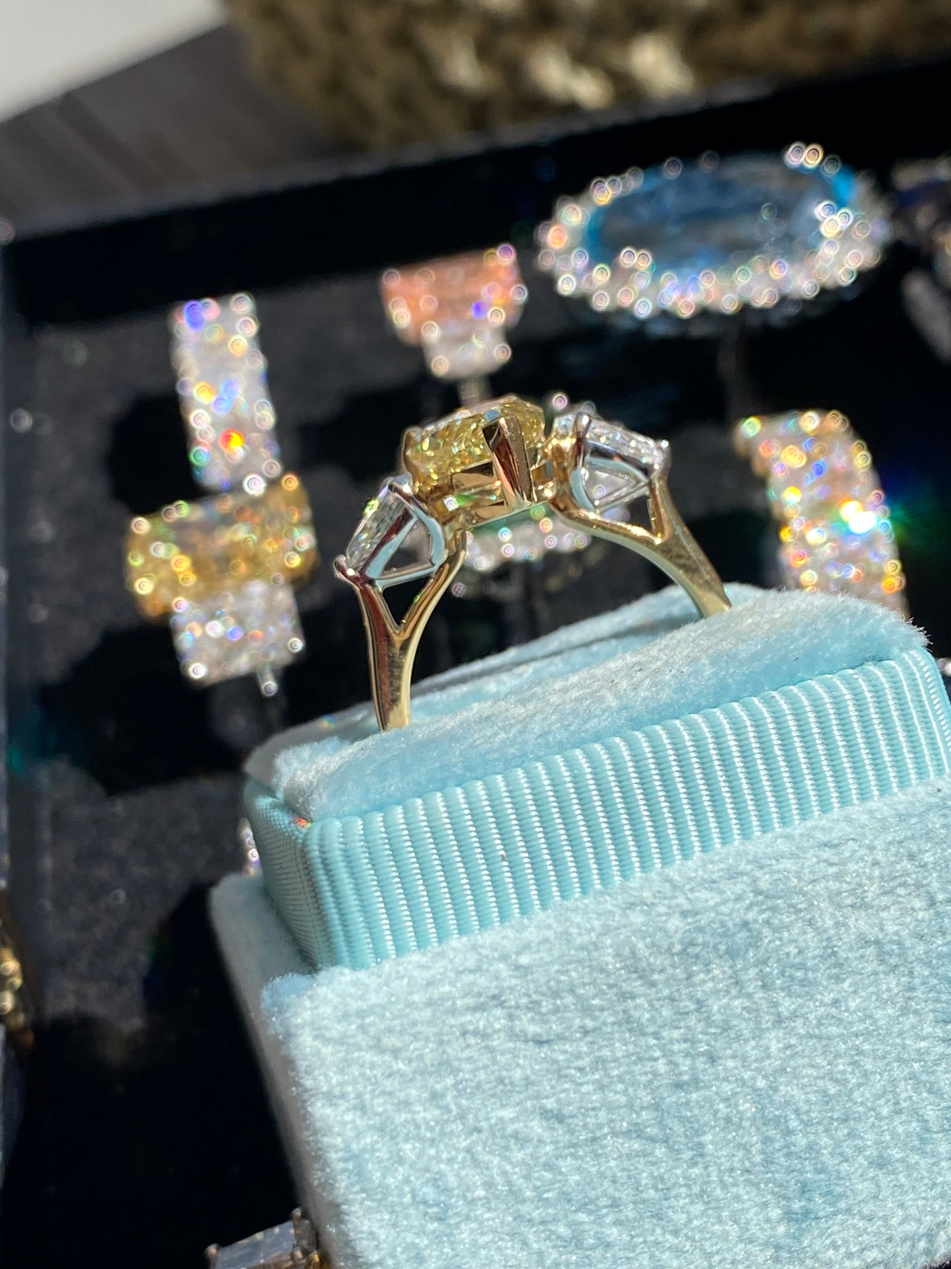 4.04 CTW Pear Cut Fancy Yellow Lab Diamond Three Stone Engagement Ring in 18ct Yellow and White Gold