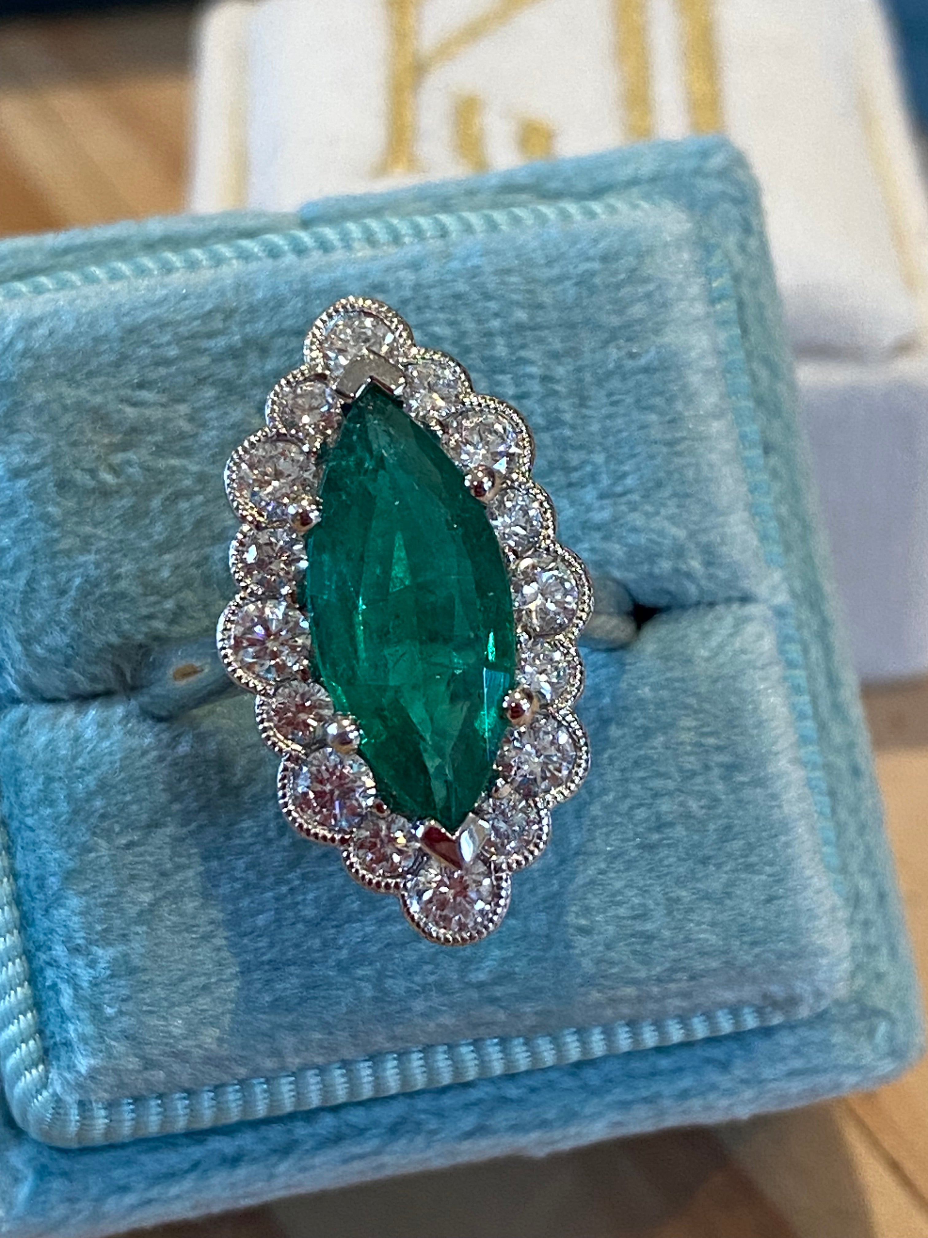 3.47 CTW Marquise Cut Emerald and Natural Diamond Halo Ring in Platinum