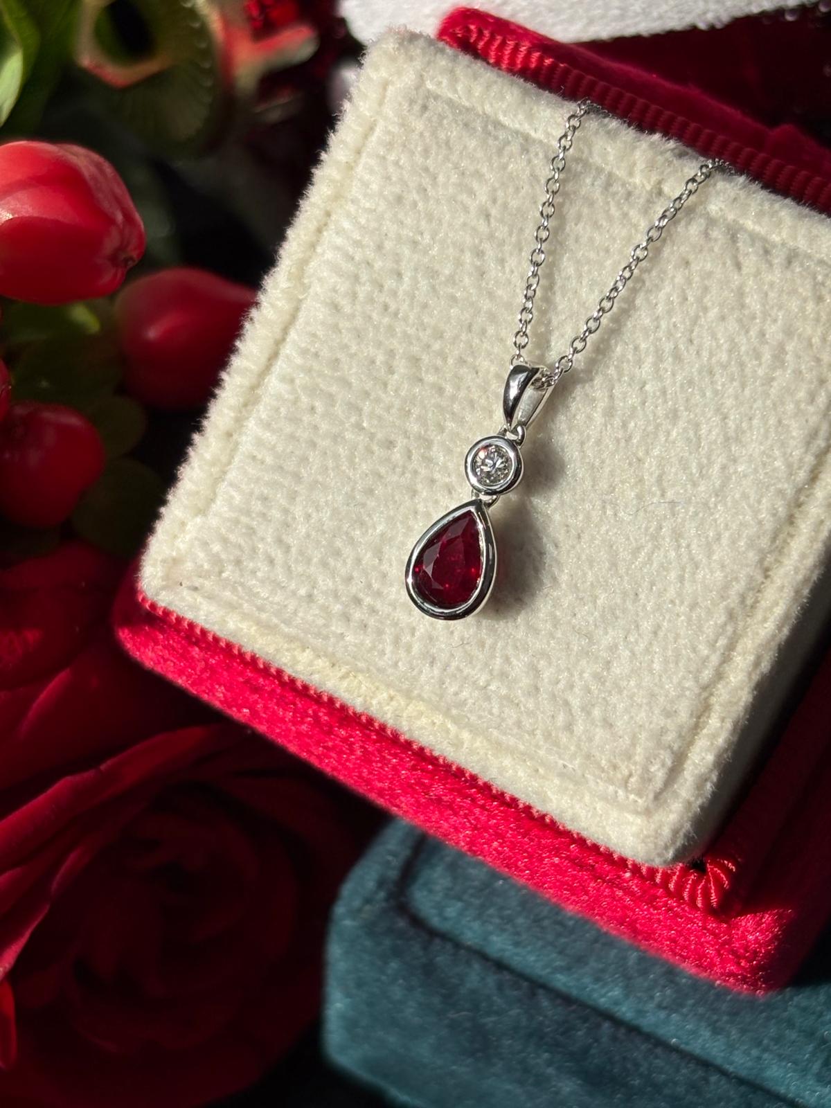 Pear Cut Ruby and Natural Diamond Pendant Necklace in 18ct White Gold