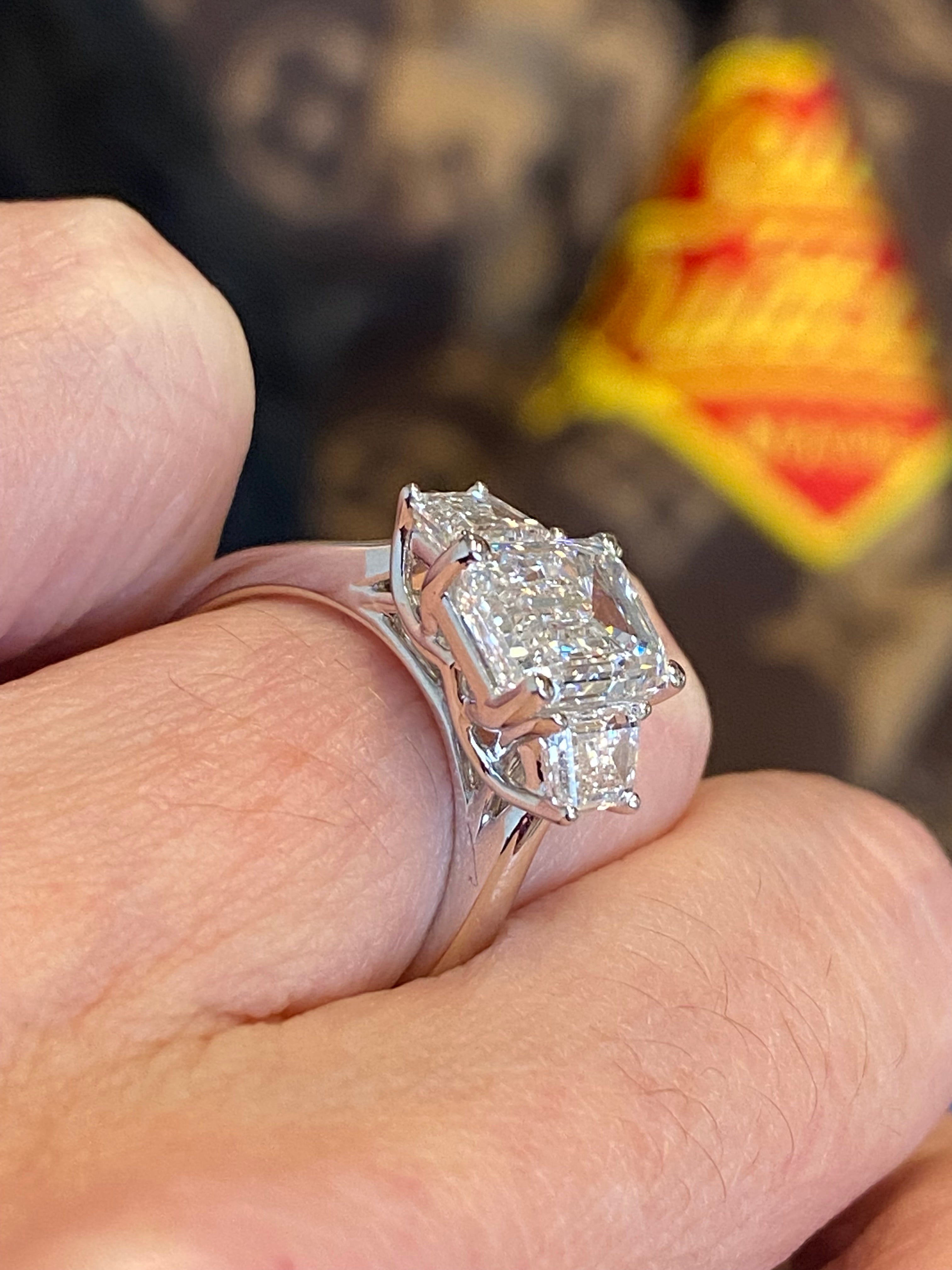 3.93 CTW Emerald and Trapezoid Cut D Colour VS1 Lab Diamond Three Stone Ring in Platinum