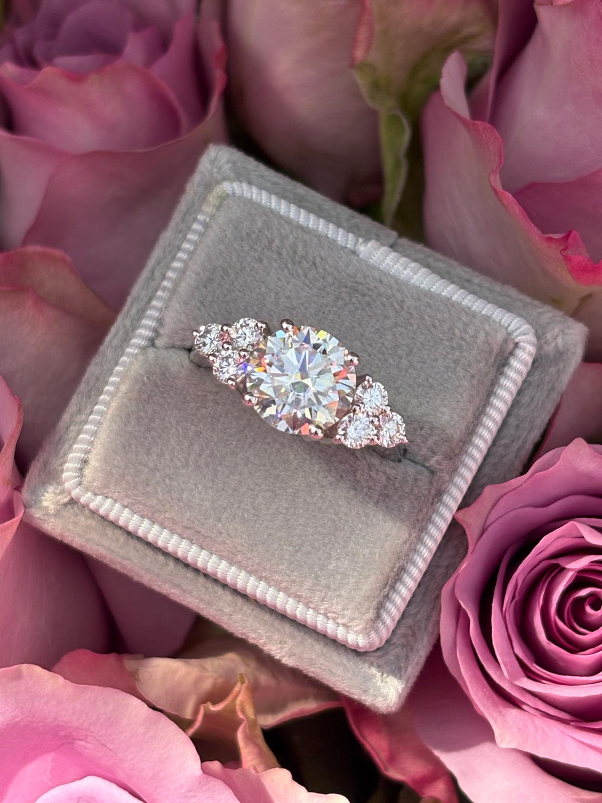 3.15 CTW Round Cut Trefoil Moissanite Three Stone Style Ring in Sterling Silver
