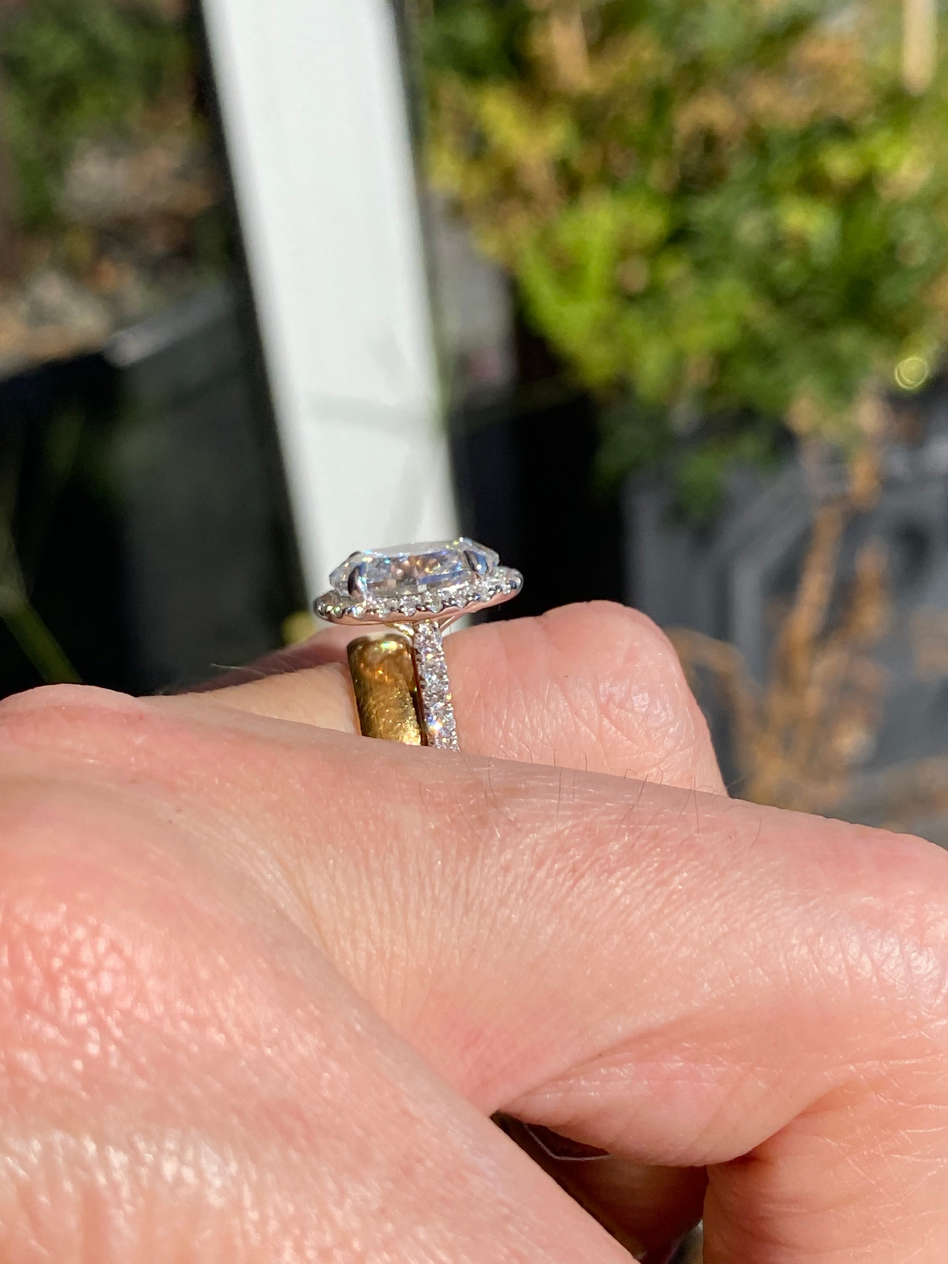 3.58 CTW Oval Cut Lab Diamond Halo Engagement Ring in Platinum