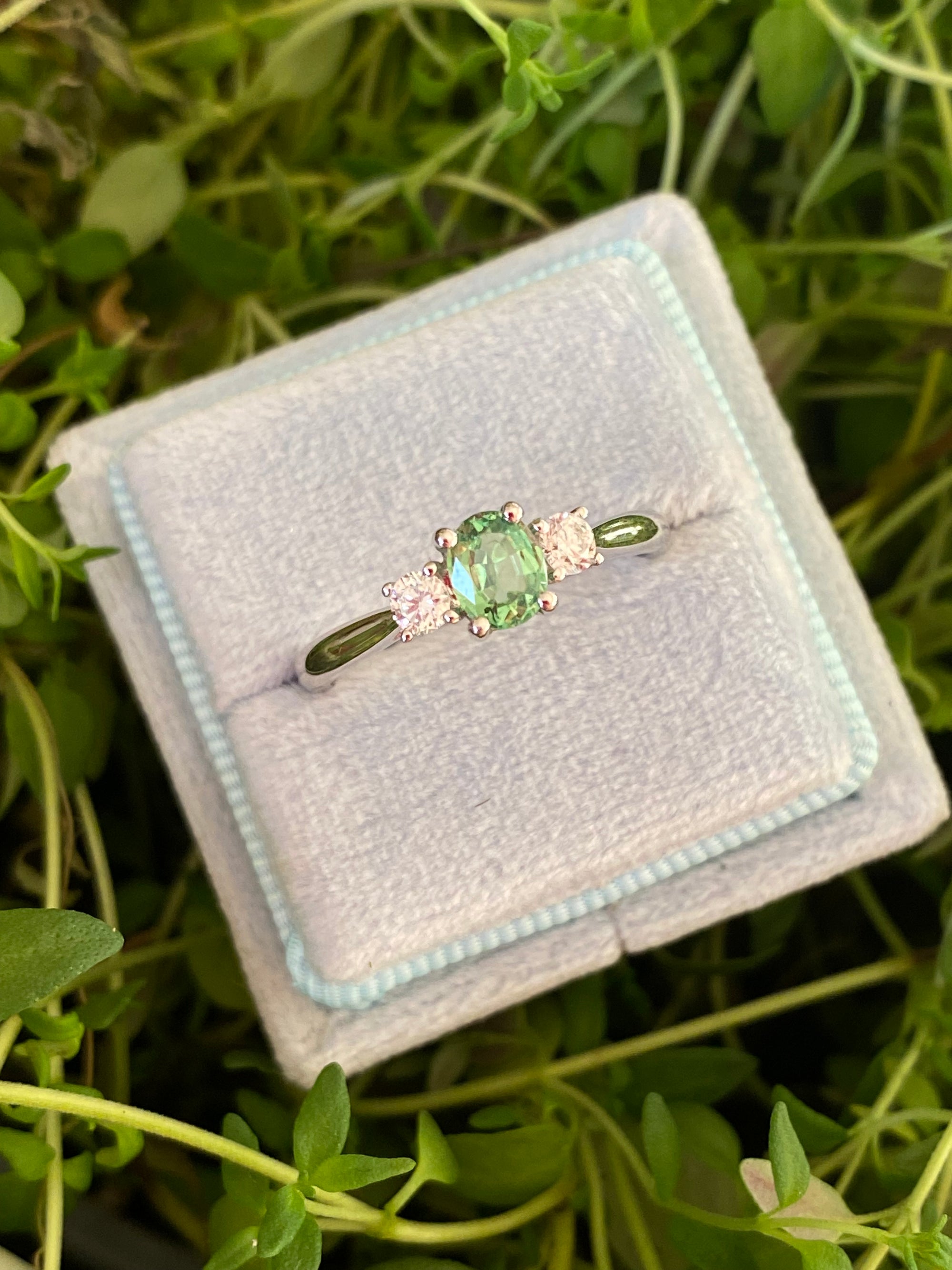 0.40 Carat Tsavorite Garnet and 0.20 Carat Diamond Three Stone Engagement Ring in Platinum