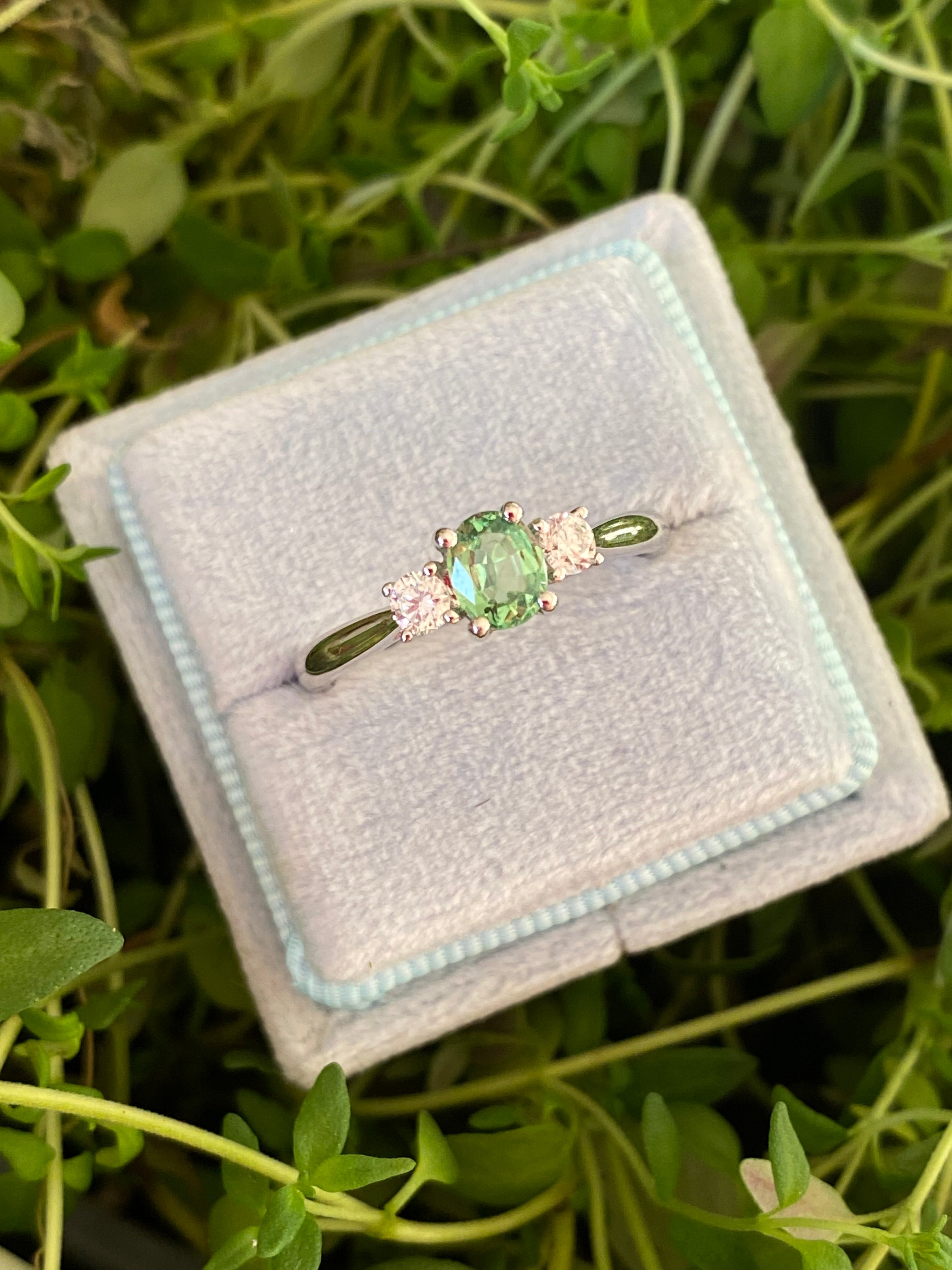 0.40 Carat Tsavorite Garnet and 0.20 Carat Diamond Three Stone Engagement Ring in Platinum