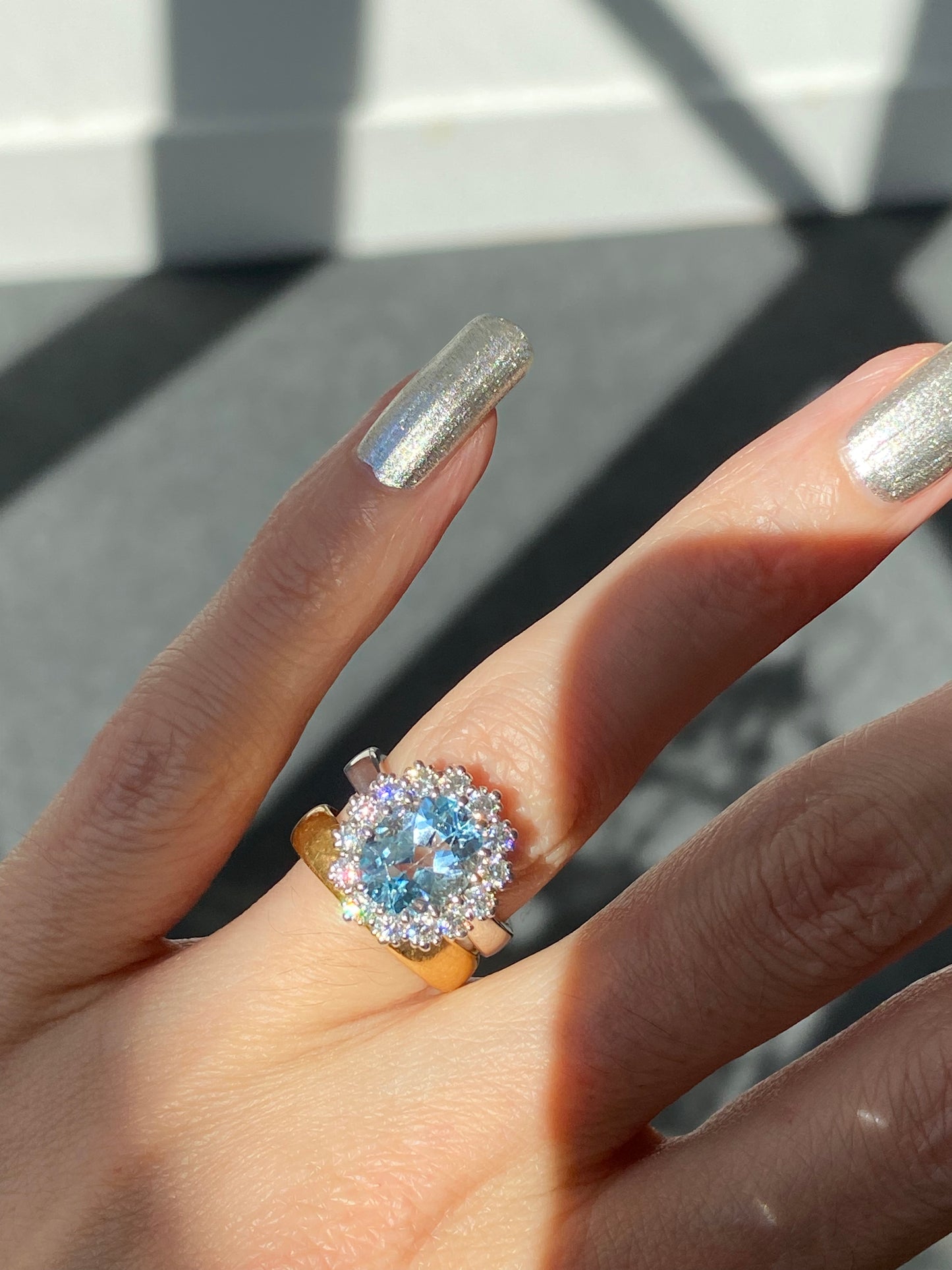 4.50 CTW Oval Cut Blue Topaz and Moissanite Halo Cluster Ring in Sterling Silver