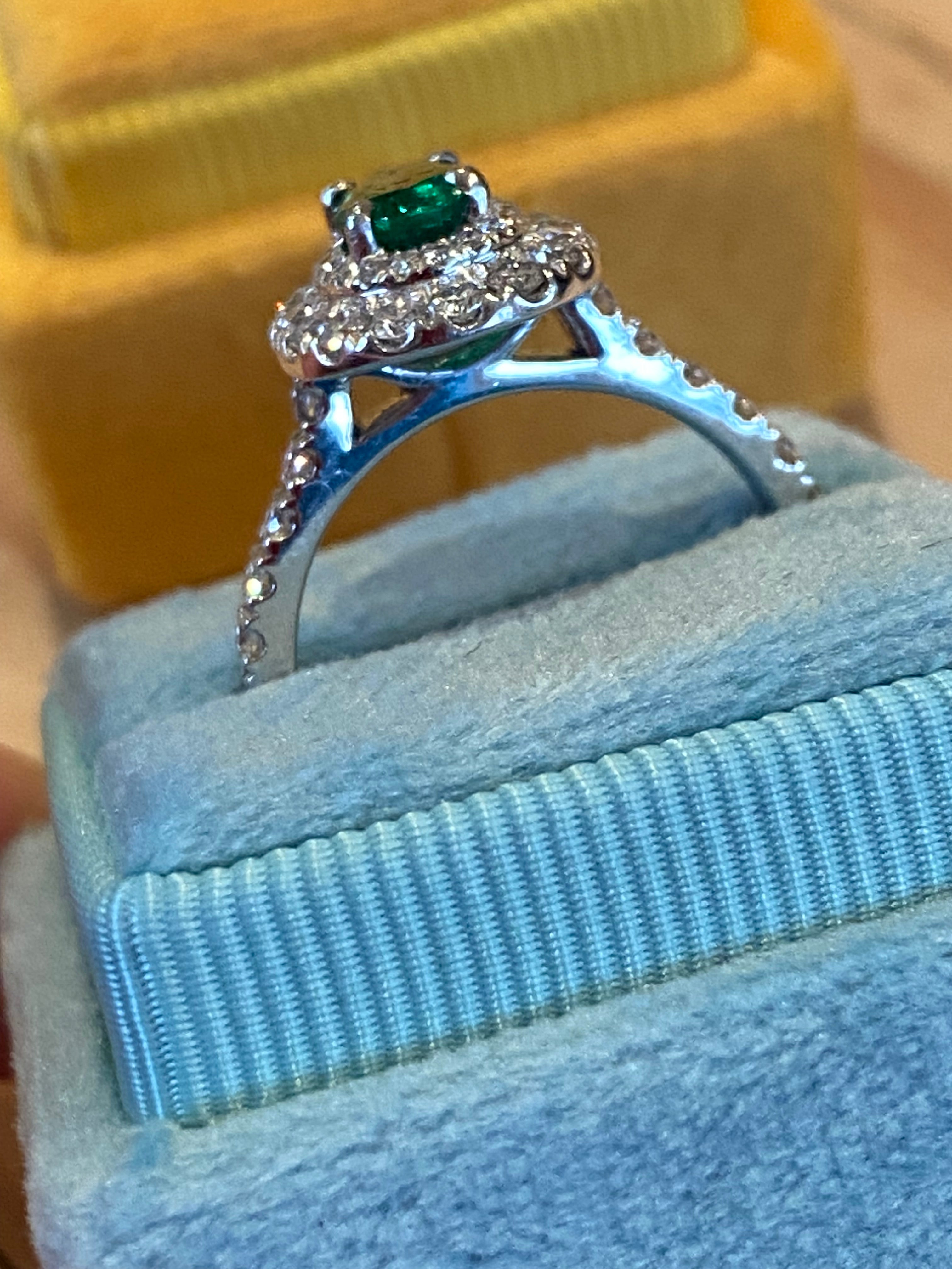 1.45 CTW Emerald and Natural Diamond Double Halo Ring in Platinum