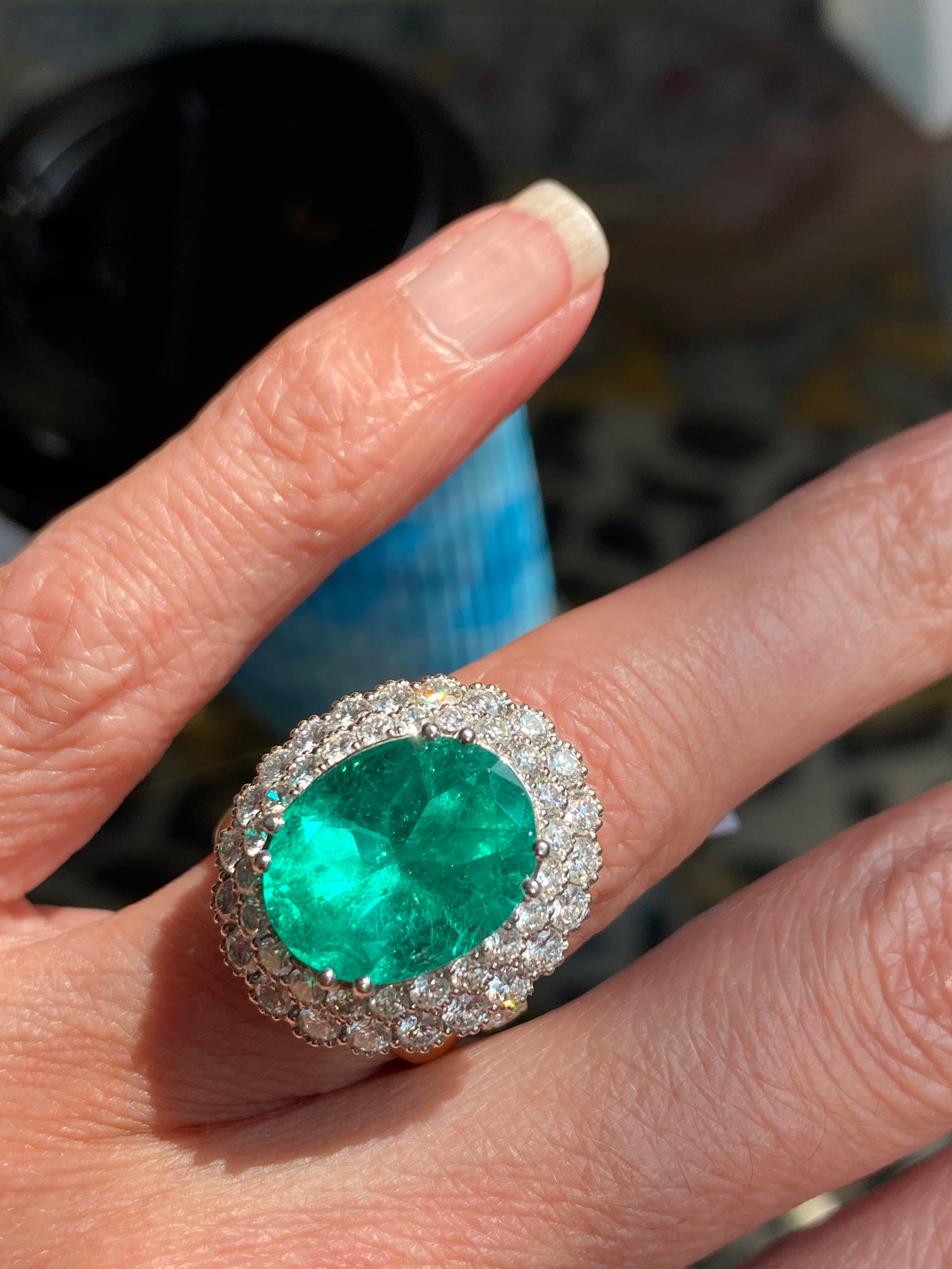 9.10 CTW Colombian Emerald and Natural Diamond Double Halo Ring in Platinum
