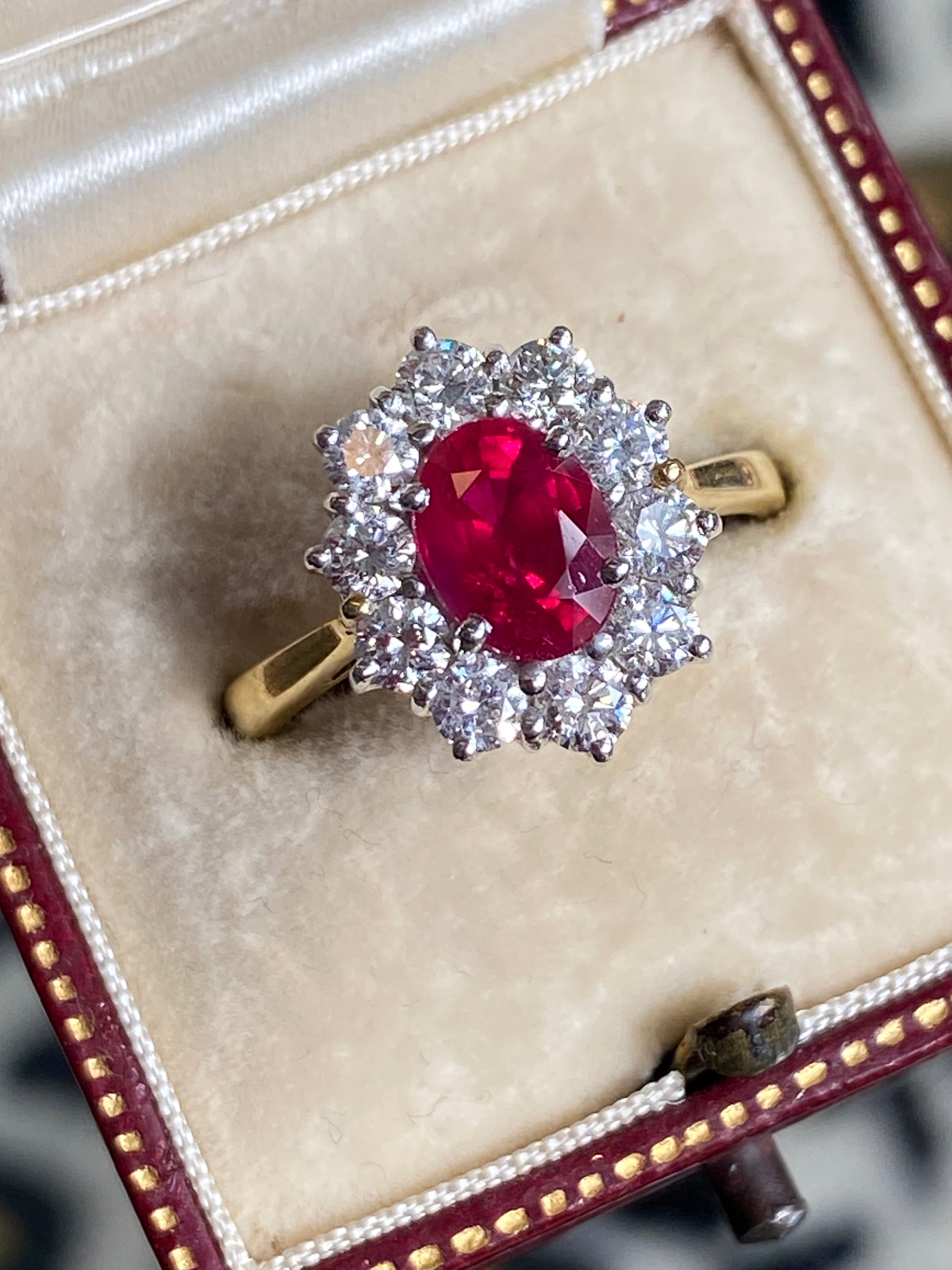 Breathtaking Ruby and Natural Diamond Halo Ring in 18ct Gold
