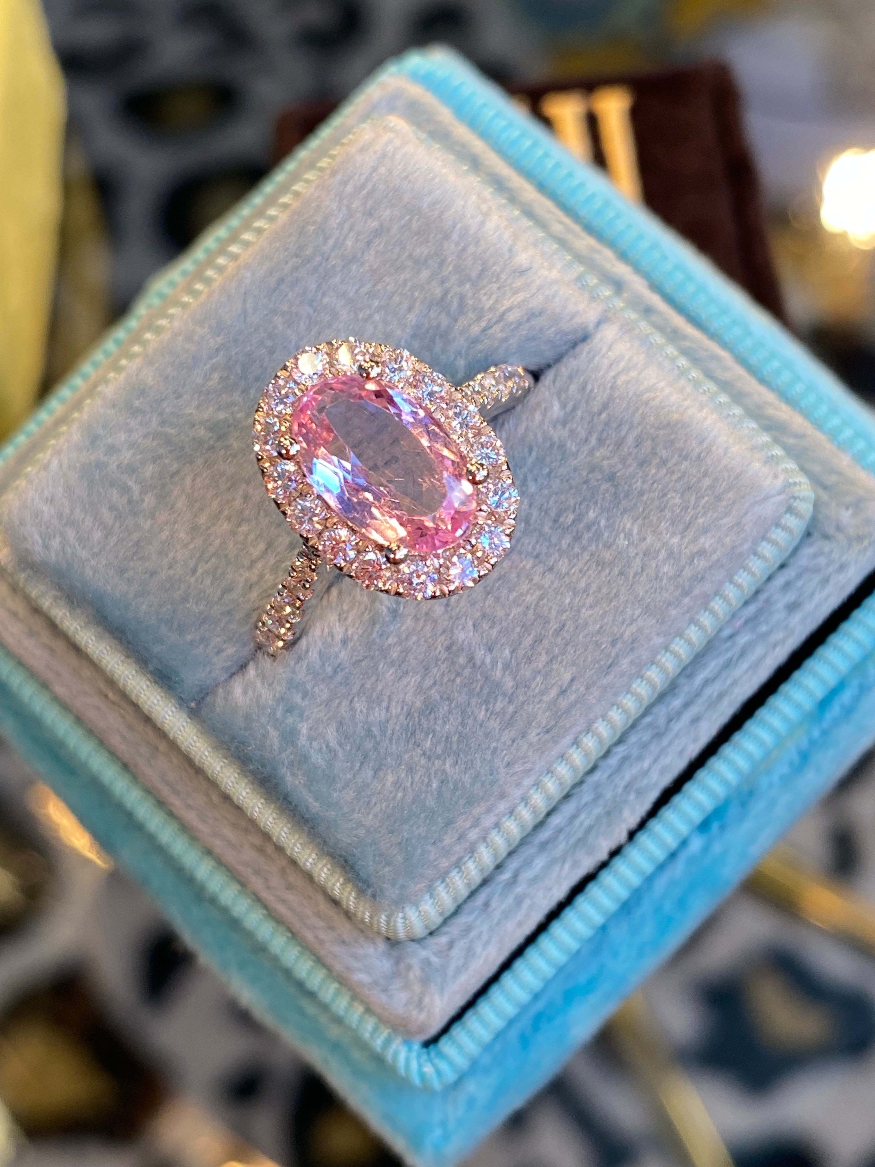 1.94 CTW Oval Cut Pink Topaz and Natural Diamond Halo Ring in Platinum