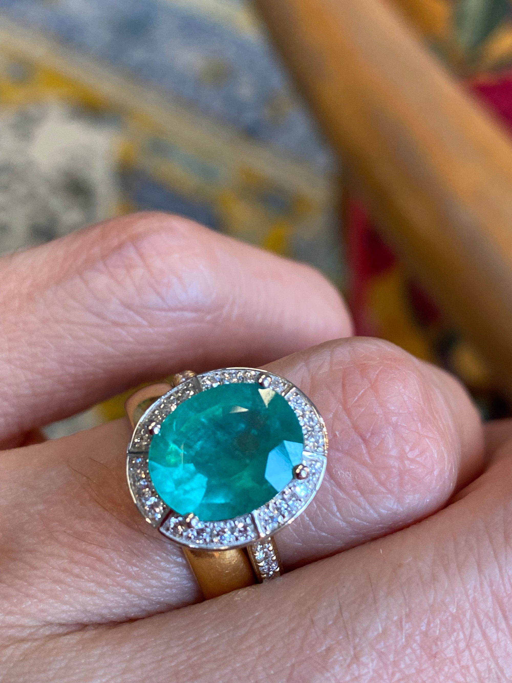 3.21 CTW Oval Cut Emerald and Natural Diamond Halo Engagement Ring in Platinum and 18ct Yellow Gold