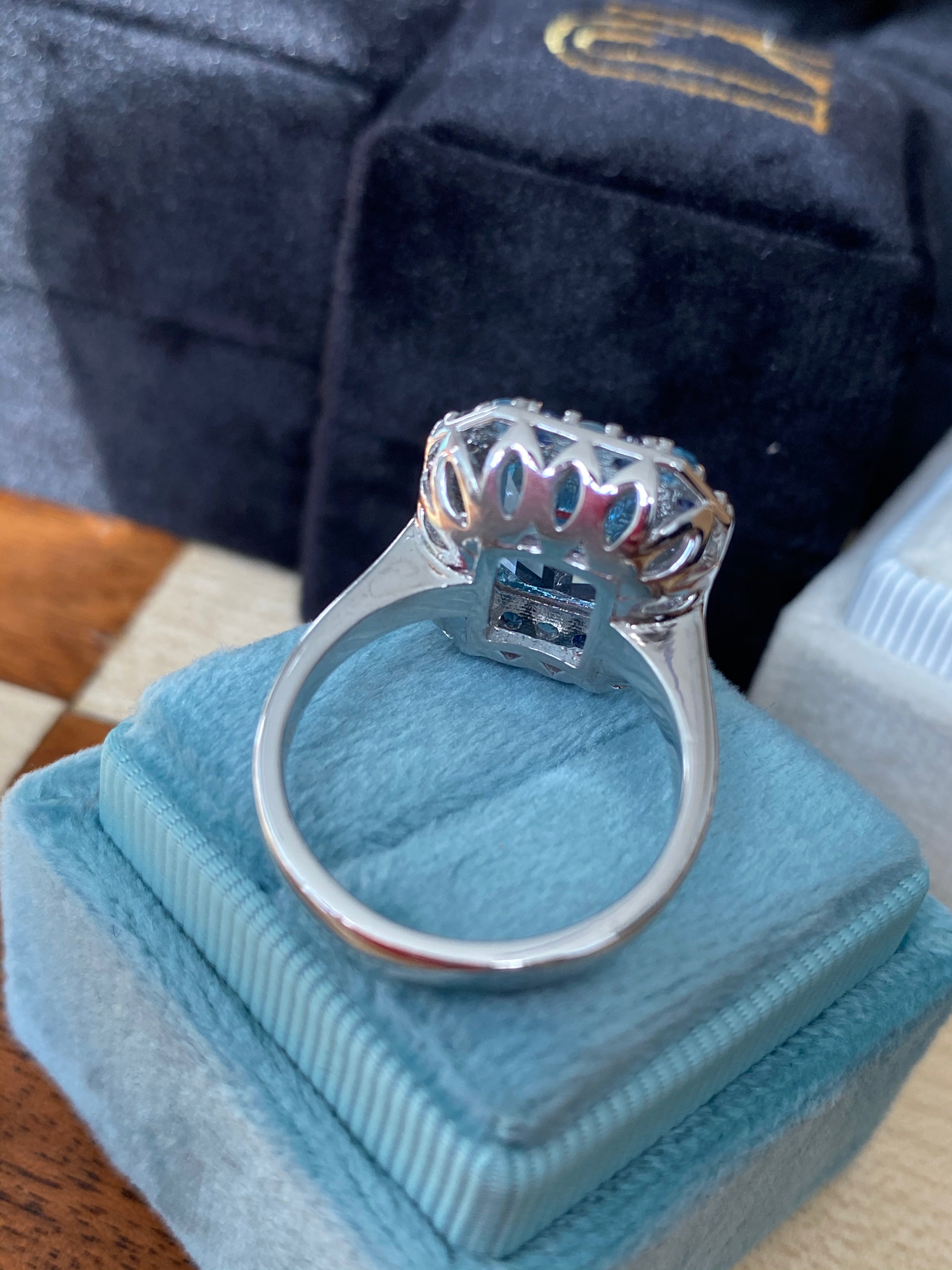Blue Topaz and Blue Sapphire Halo Cocktail Ring in Sterling Silver