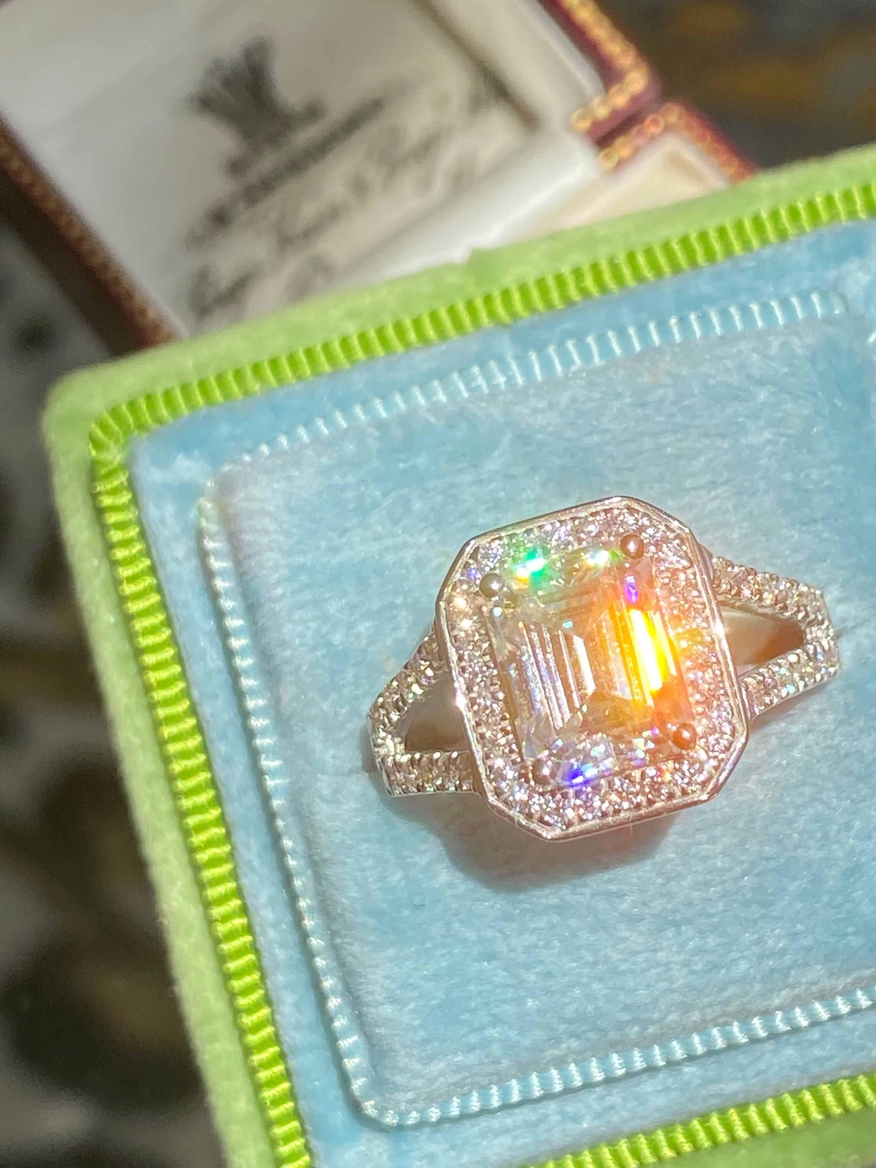 3.10 CTW Emerald Cut Moissanite Halo Ring in Sterling Silver