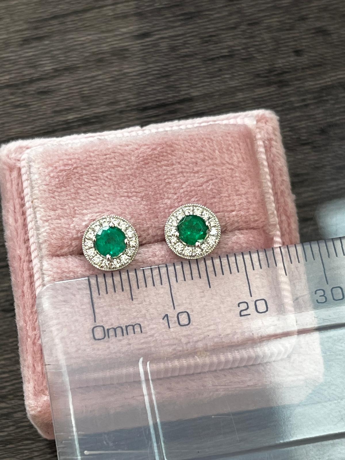 Emerald and Natural Diamond Halo Stud Earrings in 18ct White Gold