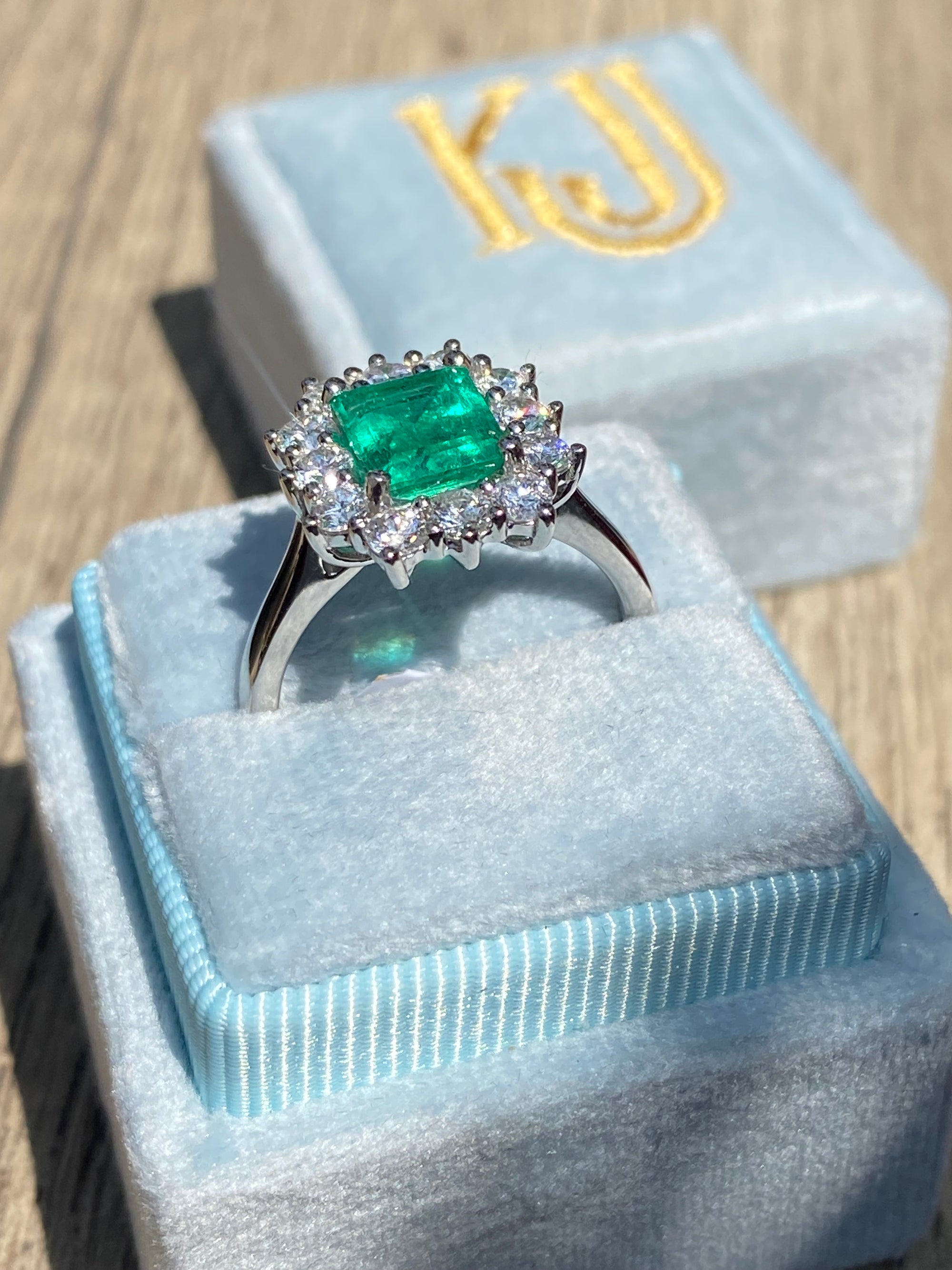 2.34 CTW Emerald Cut Colombian Emerald and Natural Diamond Halo Ring in Platinum