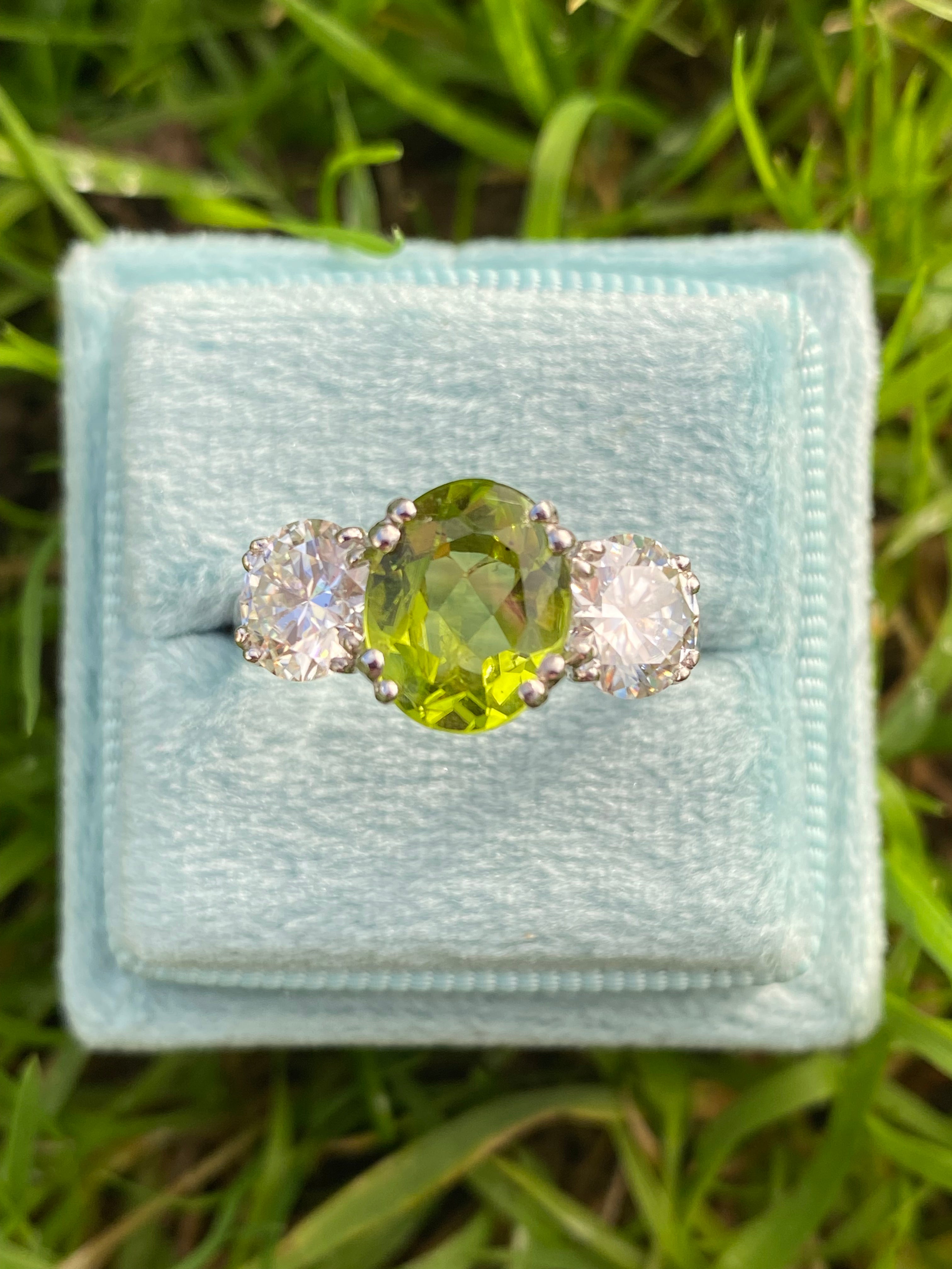 2.57 Carat Peridot and 1.84 Carat Moissanite Three Stone Ring in Sterling Silver