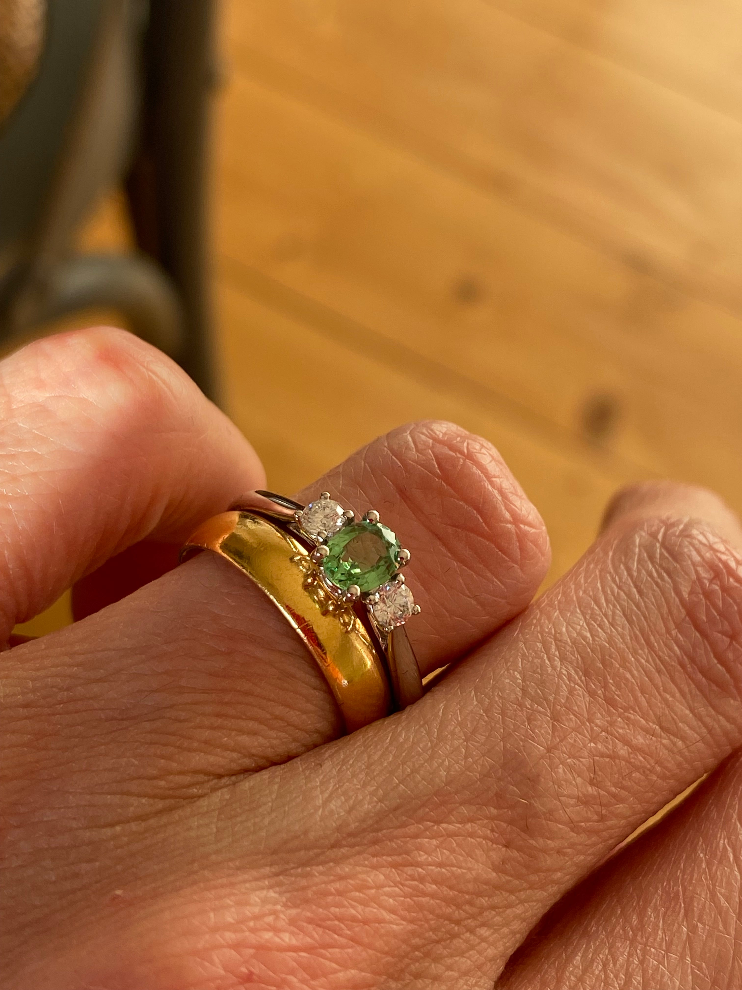 0.40 Carat Tsavorite Garnet and 0.20 Carat Diamond Three Stone Engagement Ring in Platinum