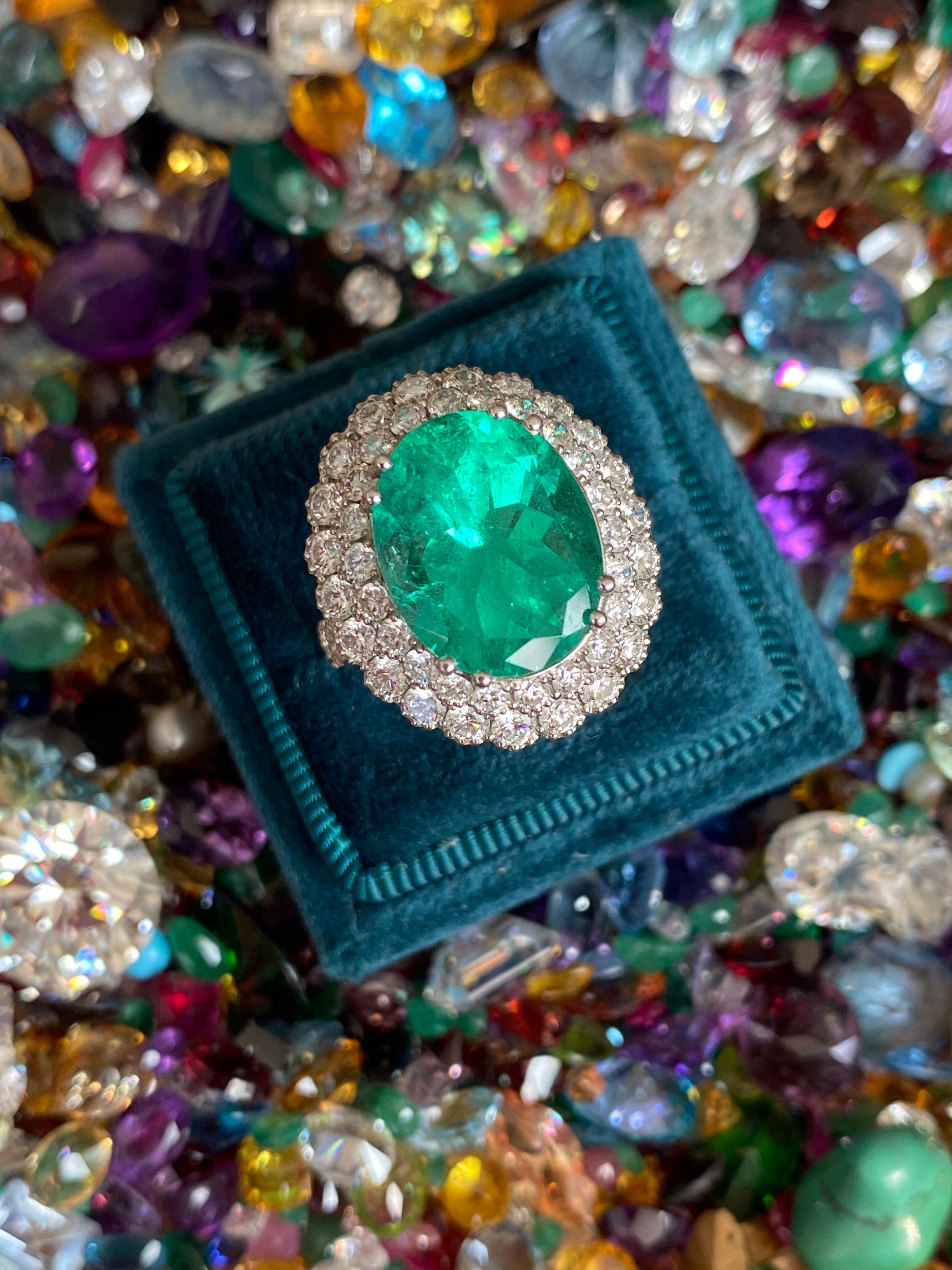 9.10 CTW Colombian Emerald and Natural Diamond Double Halo Ring in Platinum